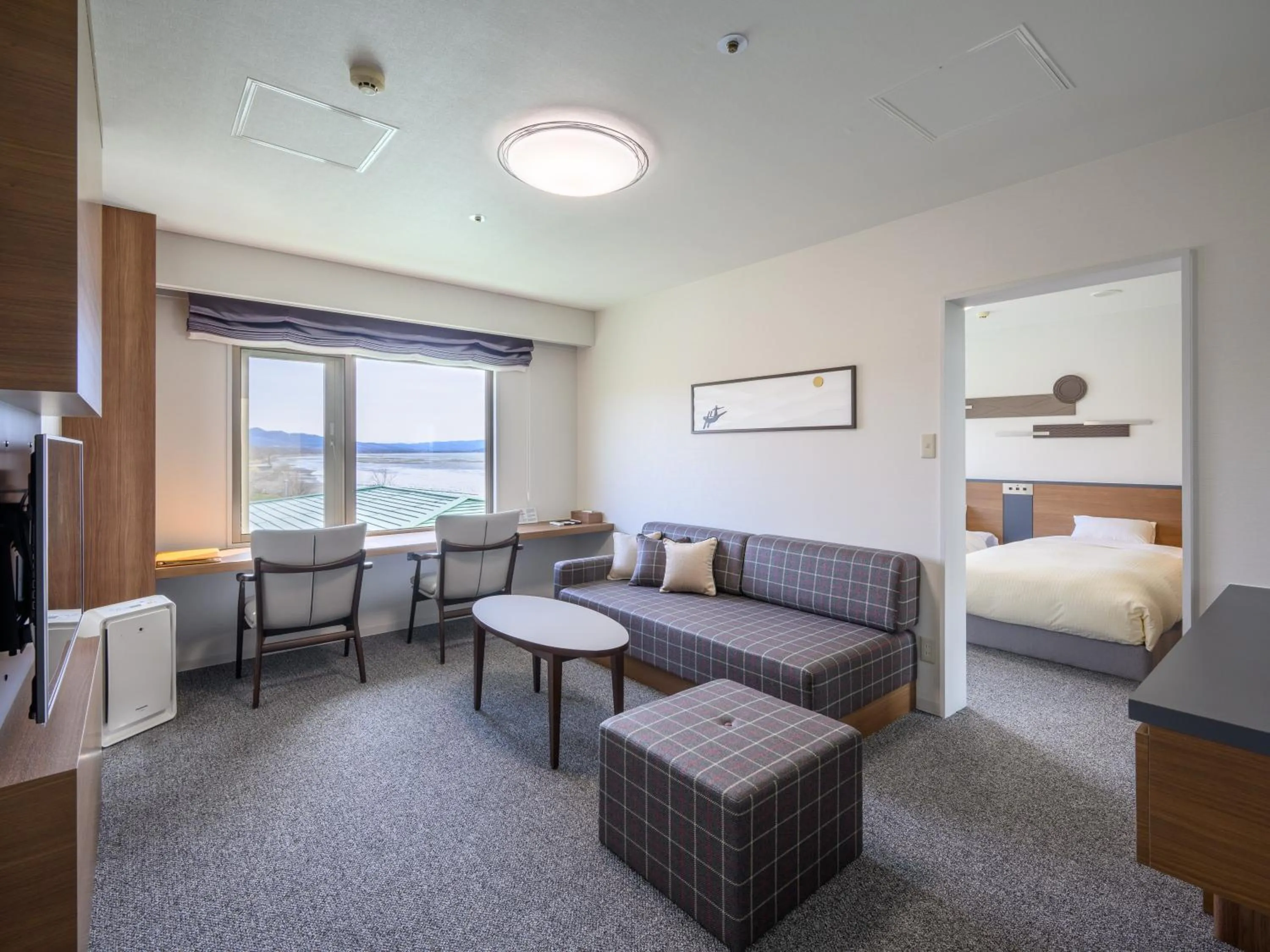 Photo of the whole room, Bed in Lake Saroma Tsuruga Resort