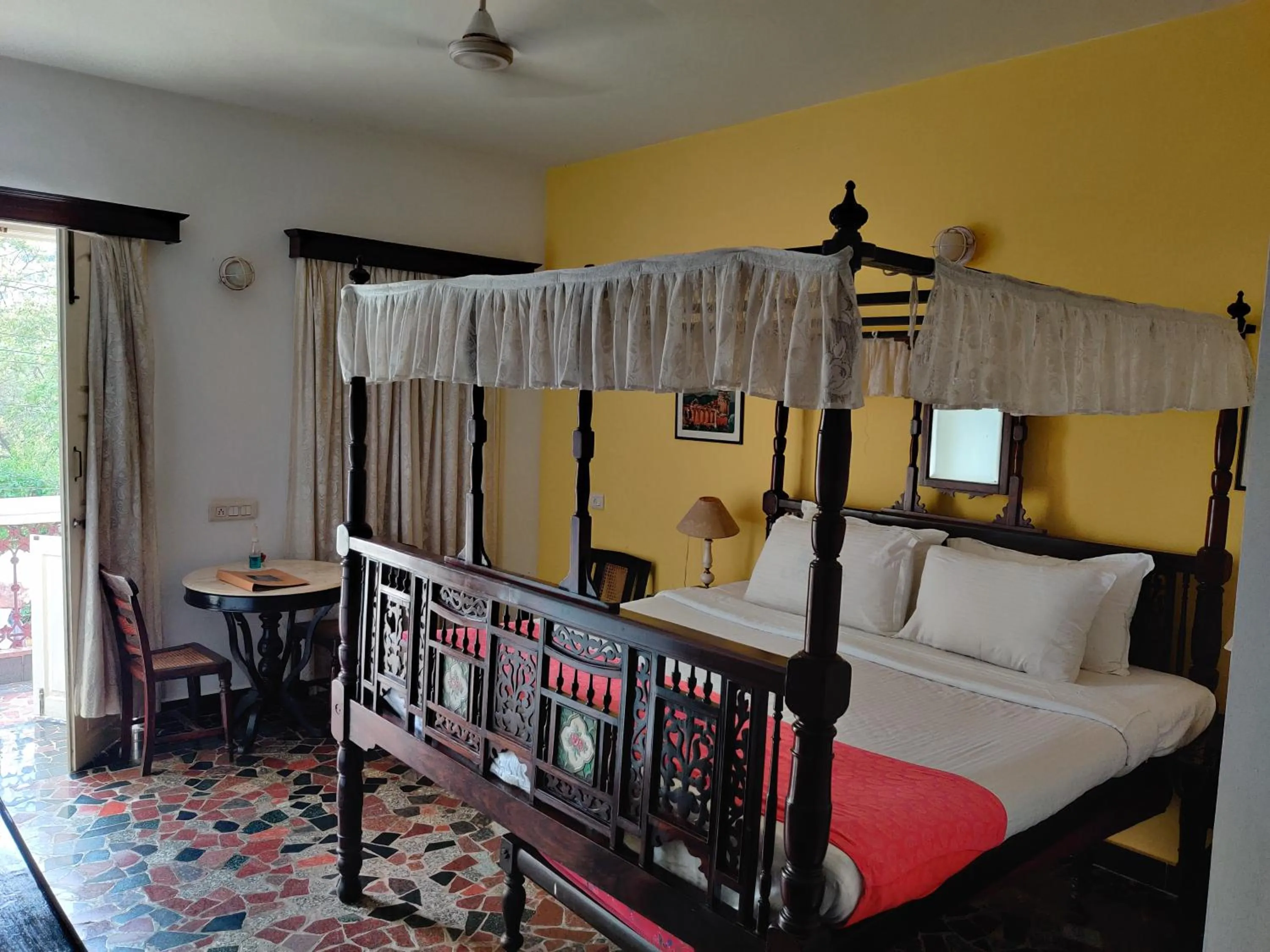 Bed in WelcomHeritage Panjim Inn