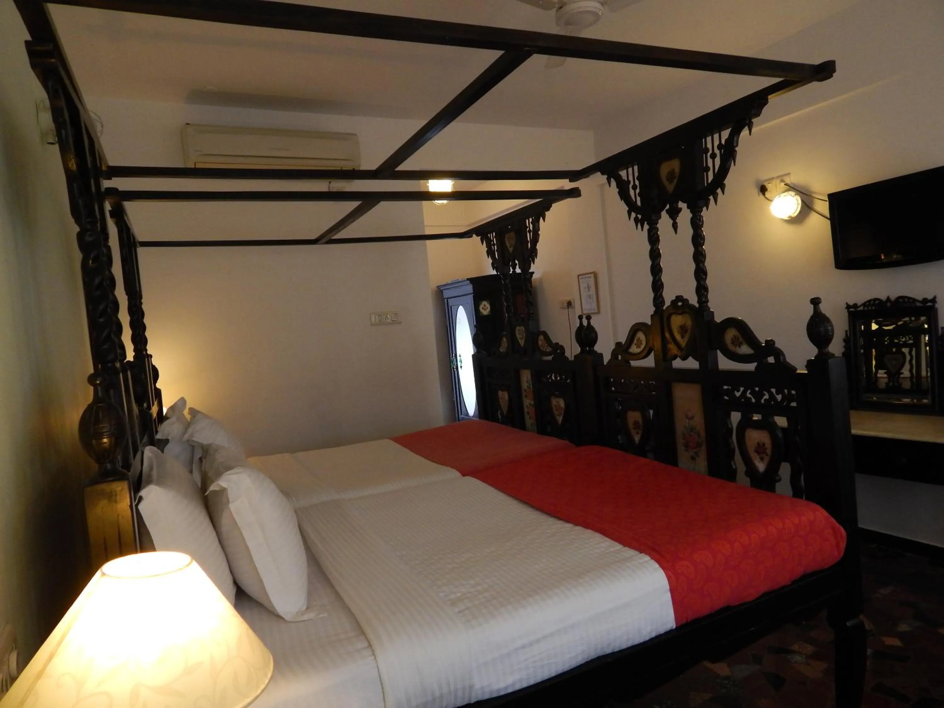 Photo of the whole room, Bed in WelcomHeritage Panjim Inn