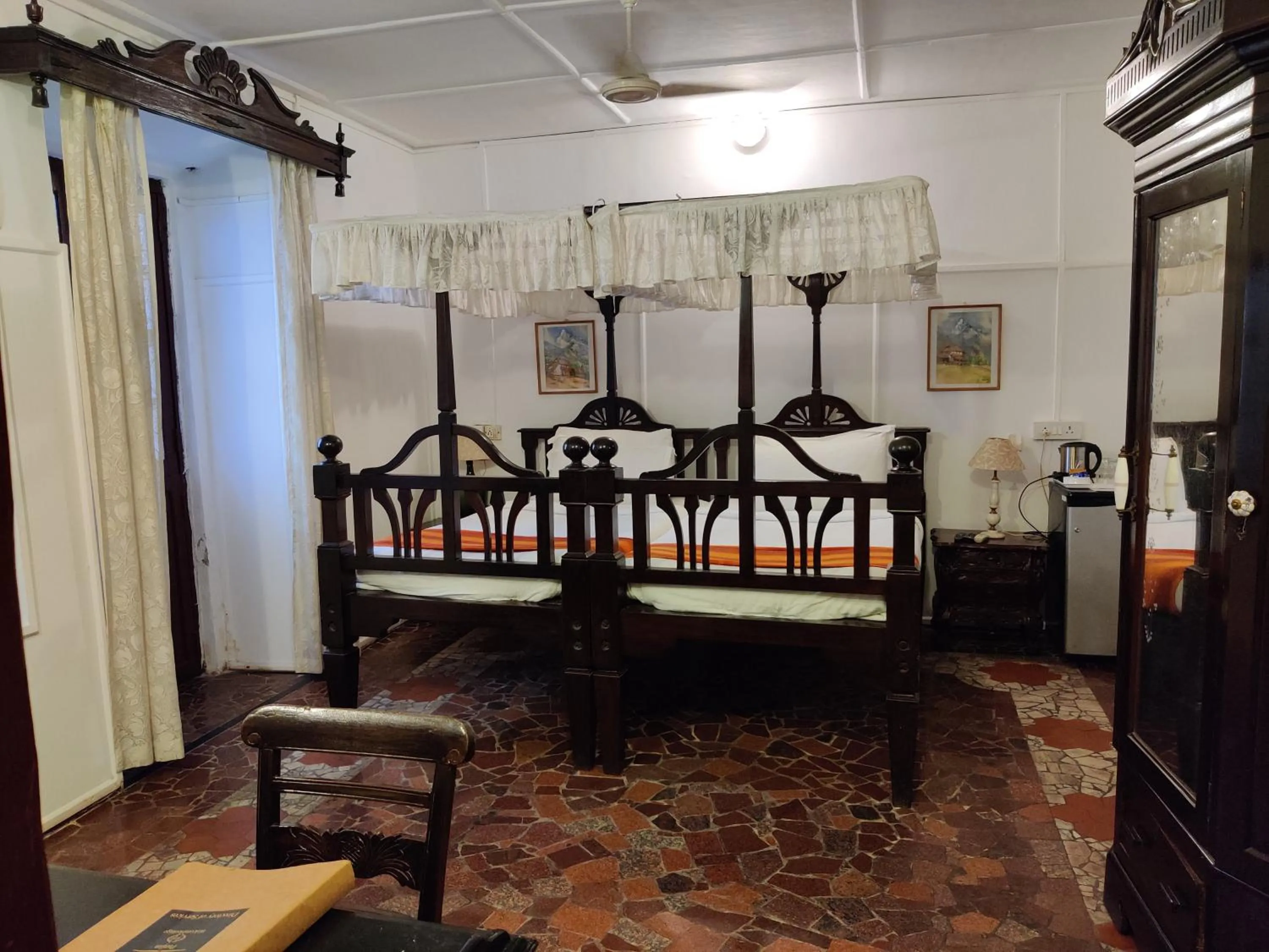 Bed in WelcomHeritage Panjim Inn