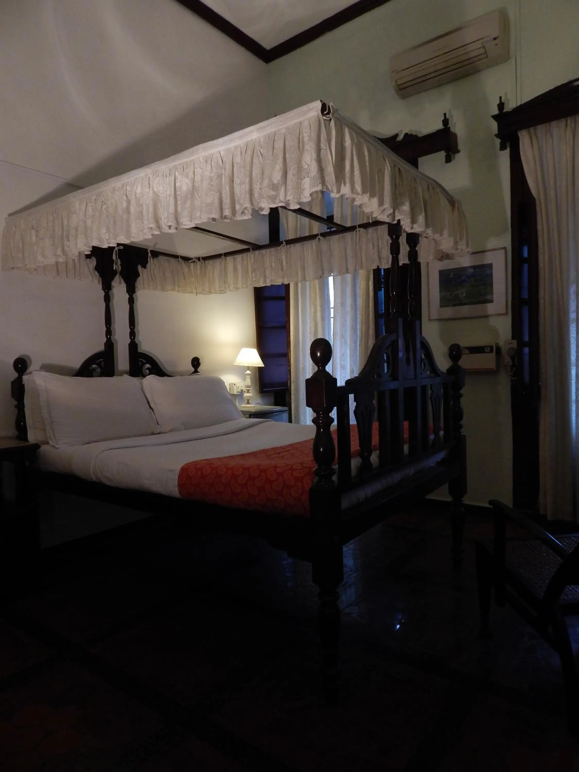 Photo of the whole room, Bed in WelcomHeritage Panjim Inn