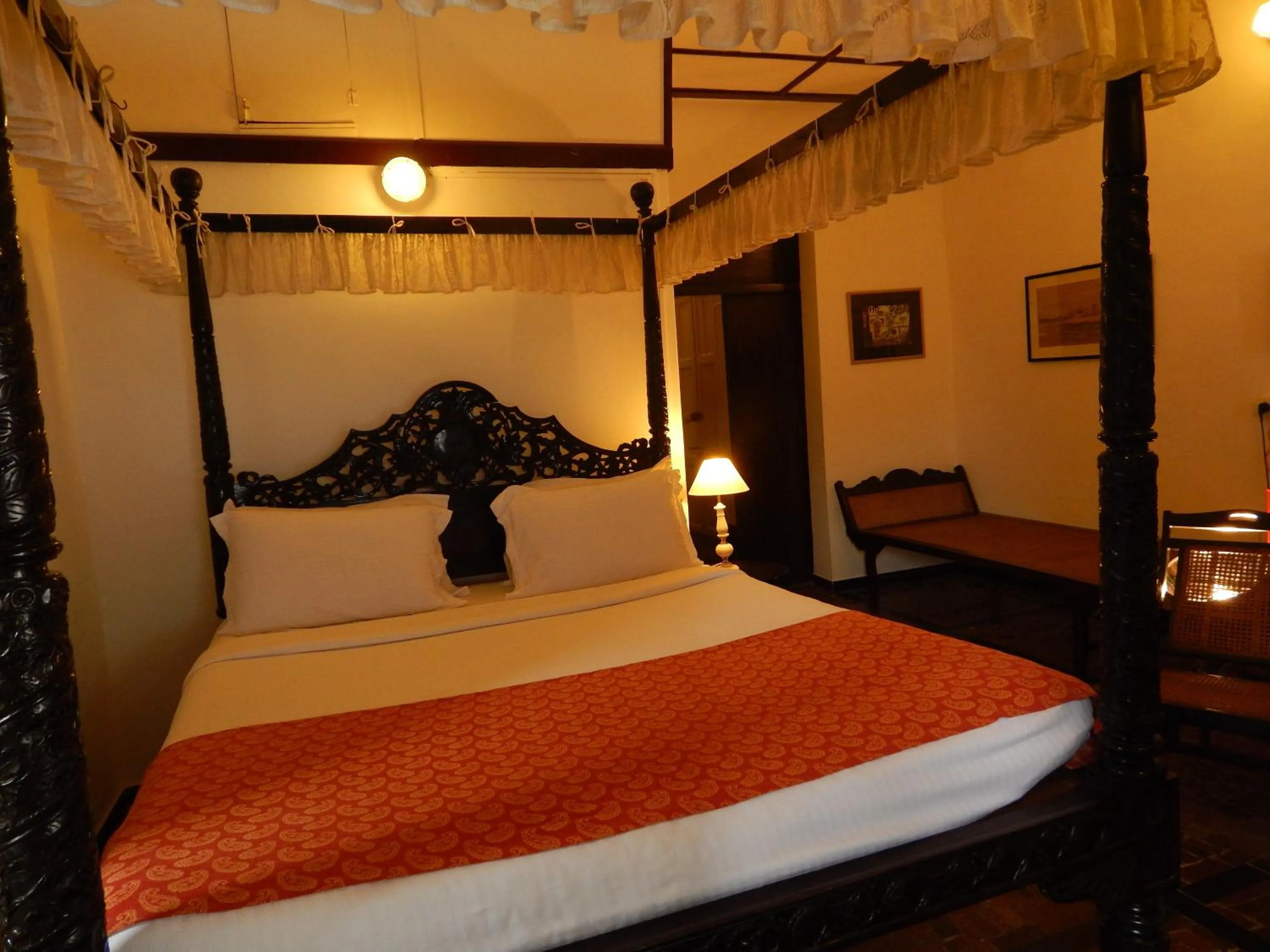 Photo of the whole room, Bed in WelcomHeritage Panjim Inn