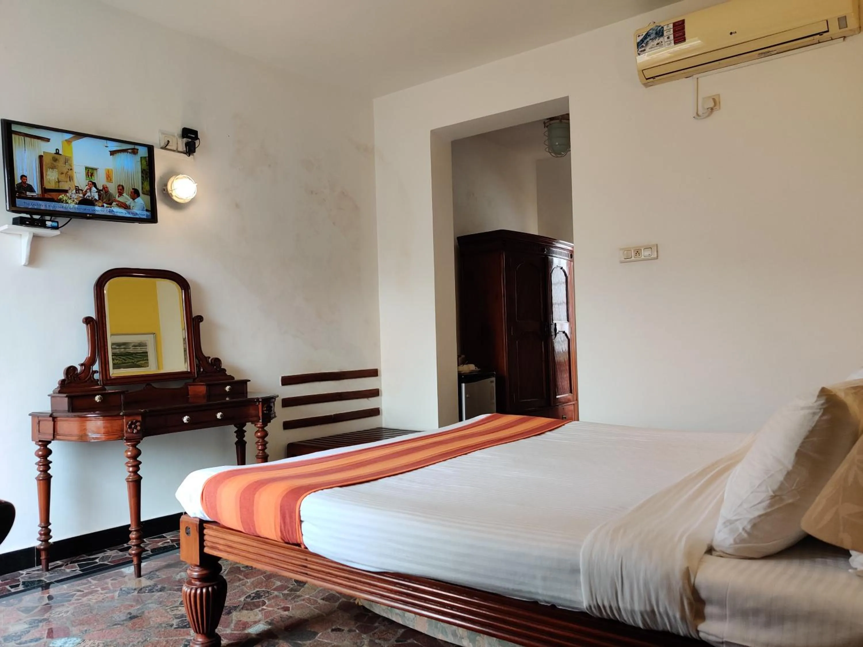 Bed in WelcomHeritage Panjim Inn