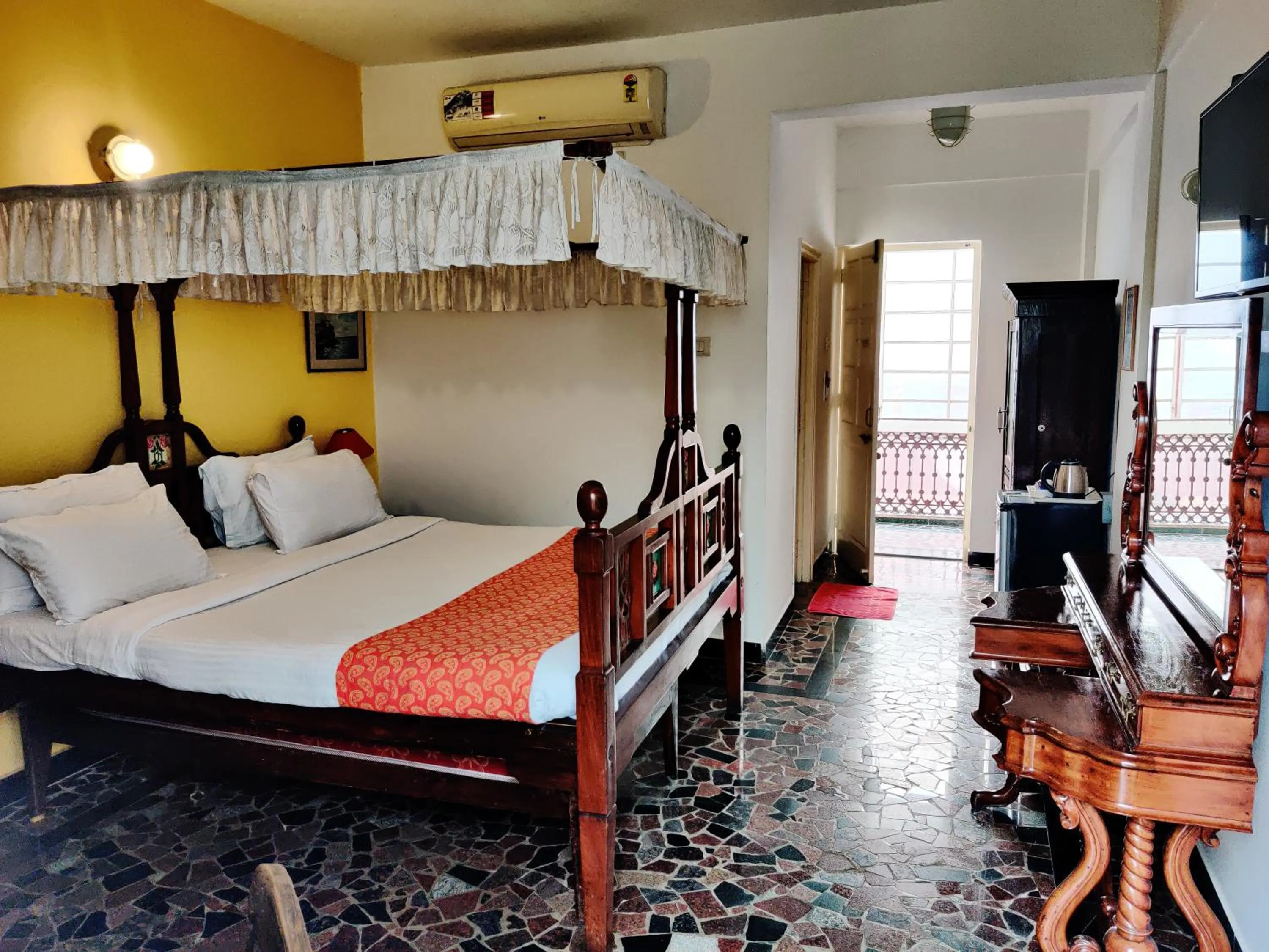 Bed in WelcomHeritage Panjim Inn