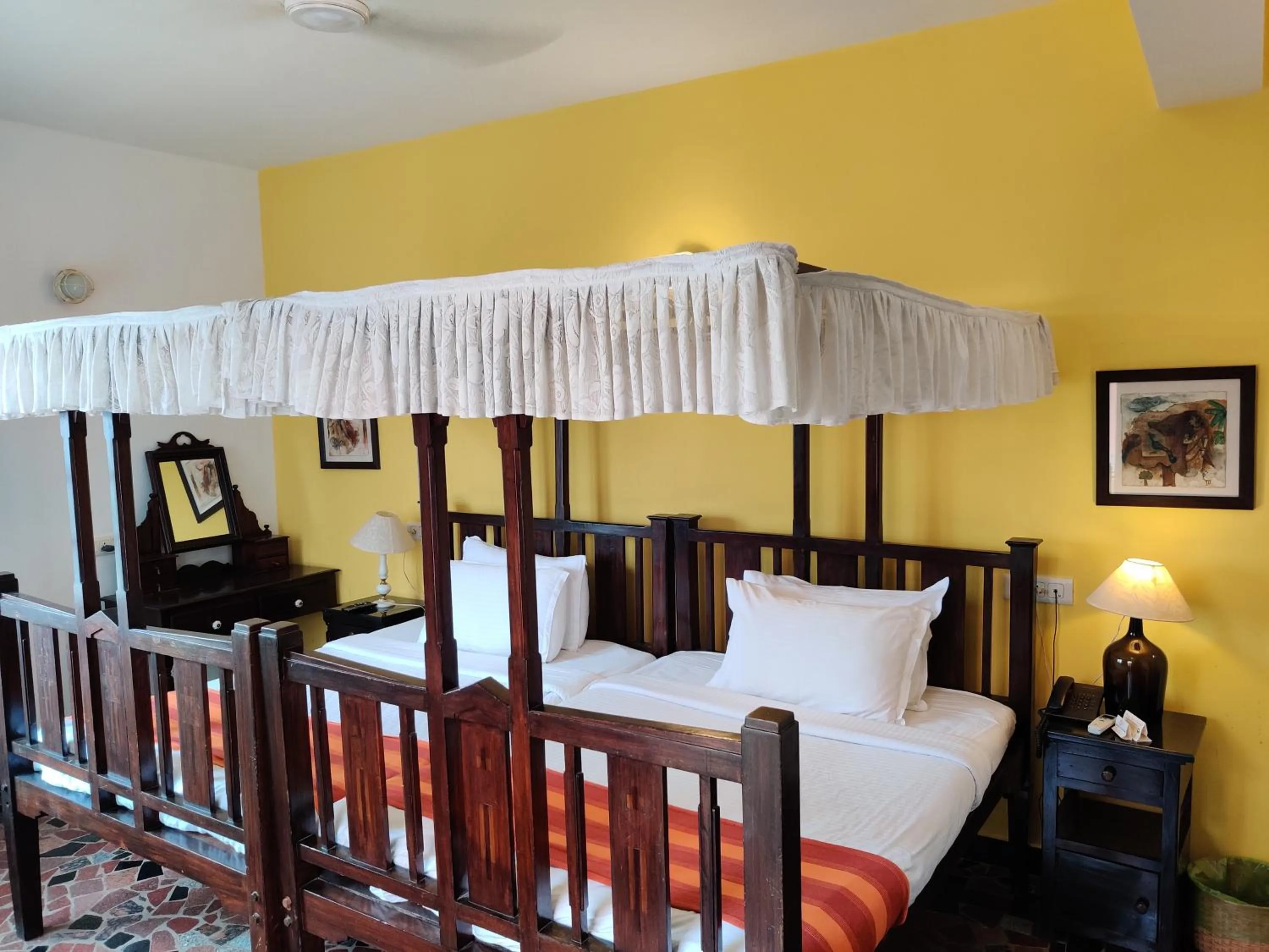 Bed in WelcomHeritage Panjim Inn