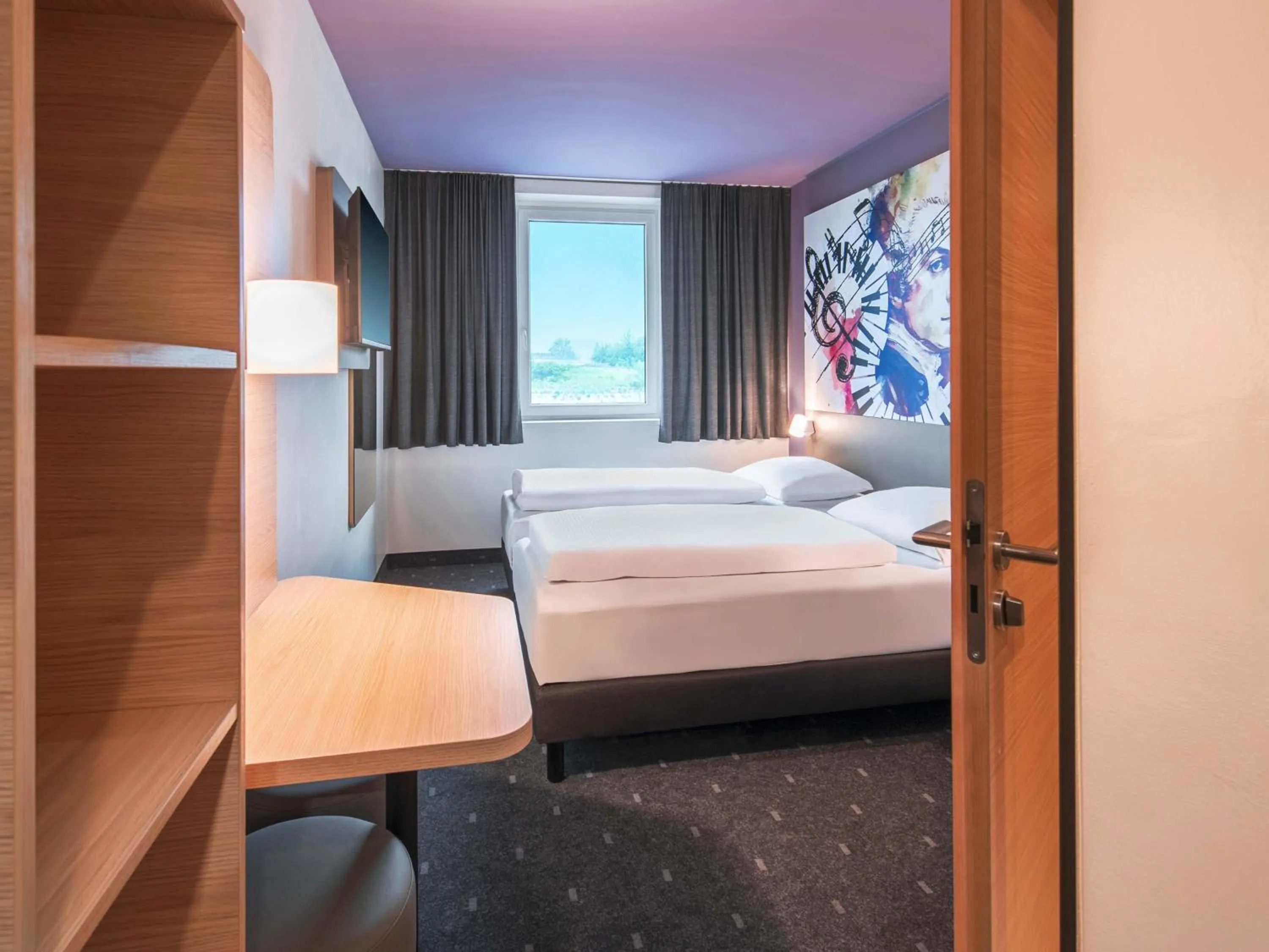 Photo of the whole room, Bed in B&B HOTEL Salzburg-Süd