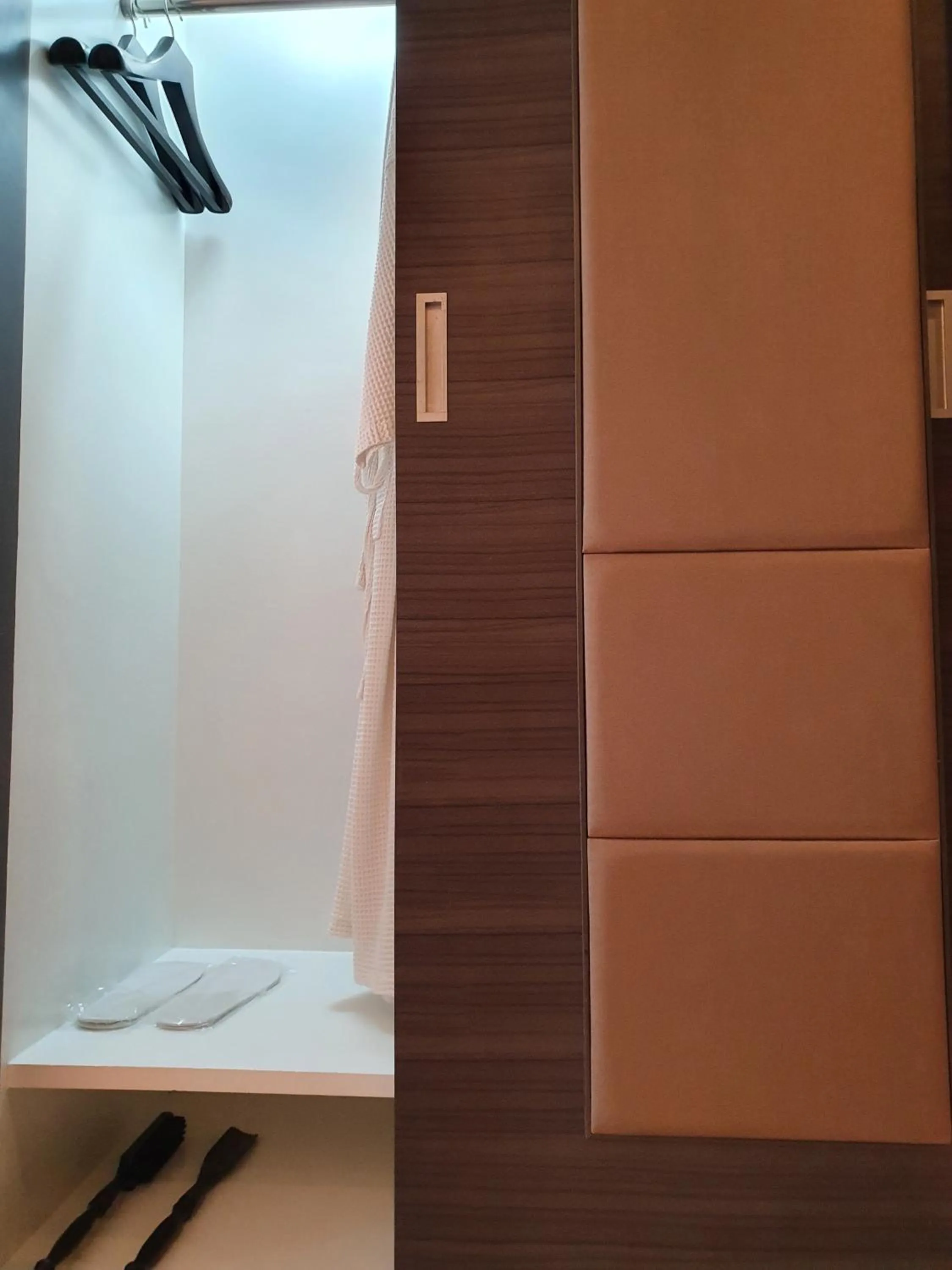 wardrobe in Amora NeoLuxe Suites Hotel