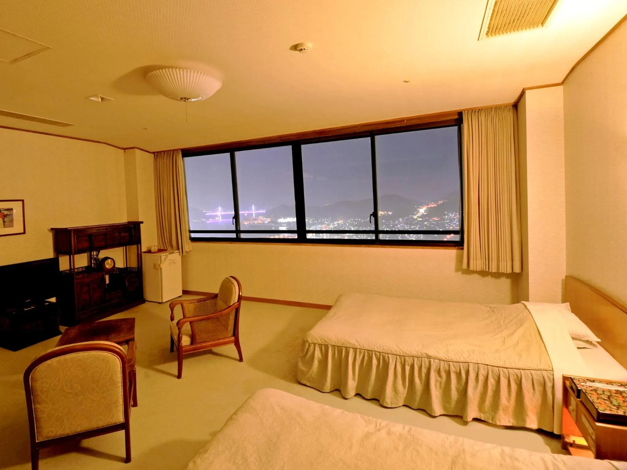 Photo of the whole room, Bed in Nisshokan Shinkan Baishokaku