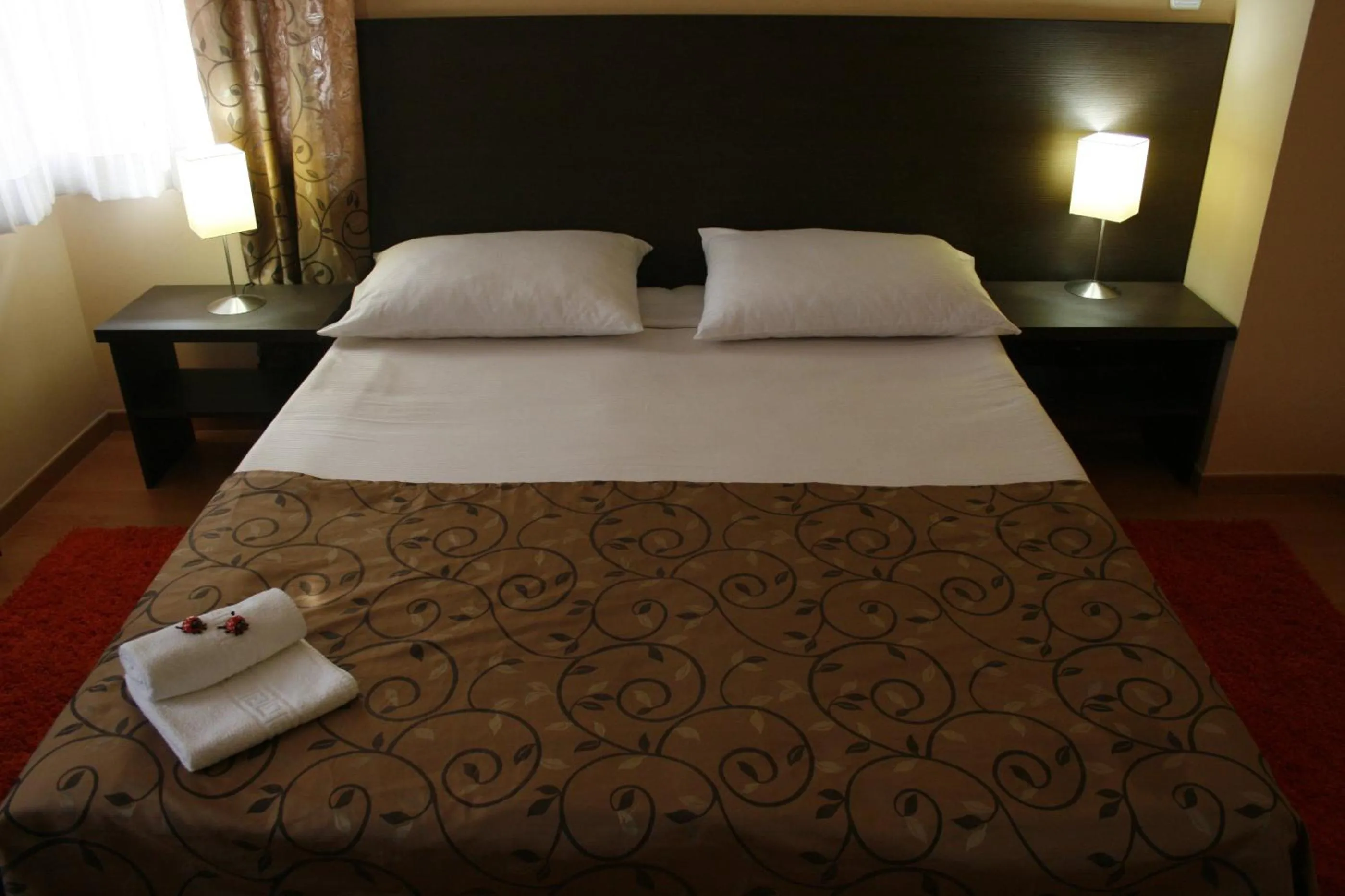 Bed in Hotel Divan