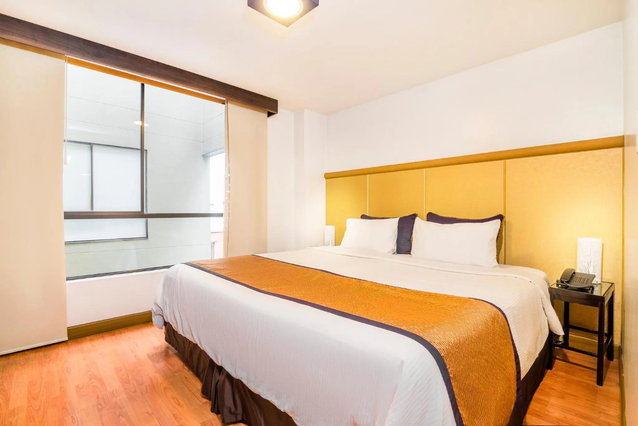 Bedroom, Bed in Lloyds Apartasuites Parque 93