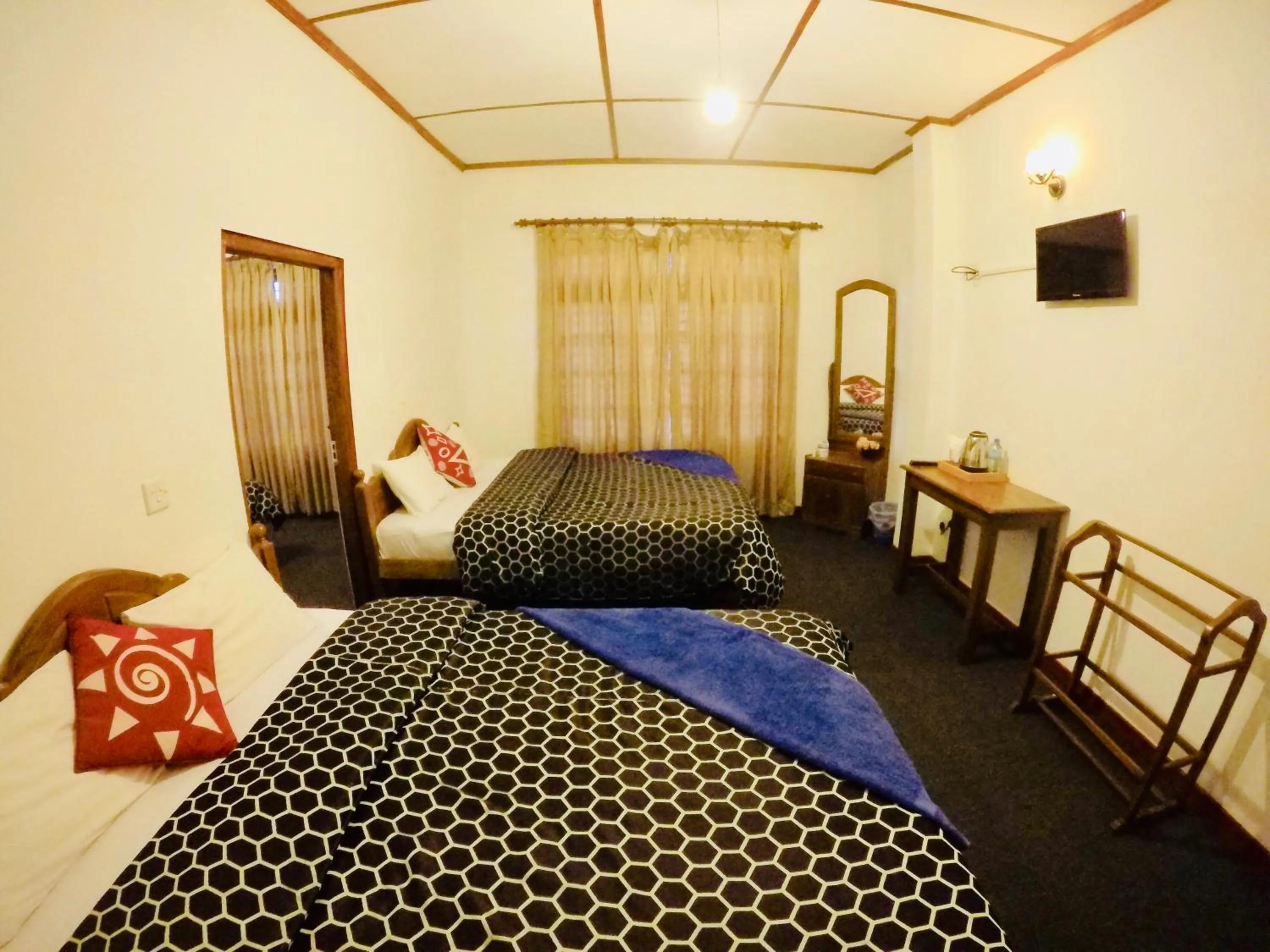 Bed in New Royal Mount Hotel