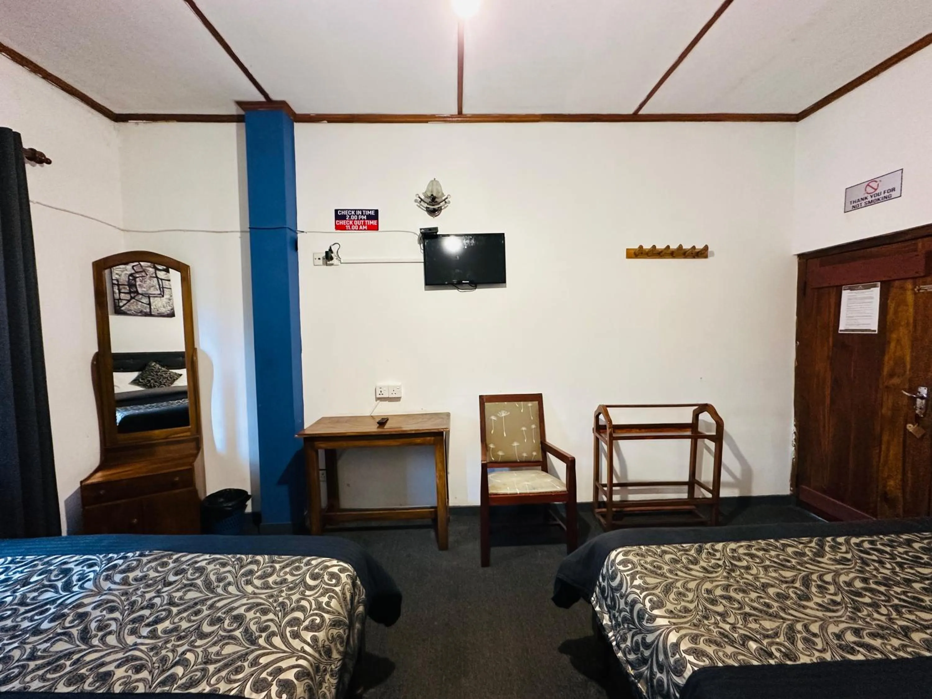 Bed in New Royal Mount Hotel