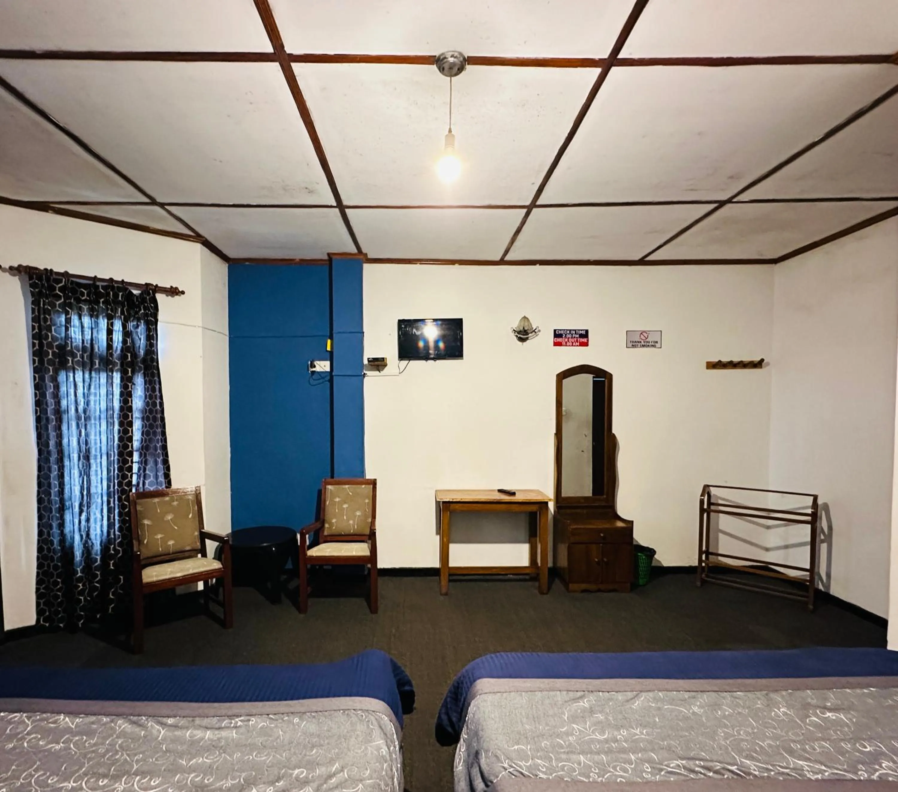 Bed in New Royal Mount Hotel