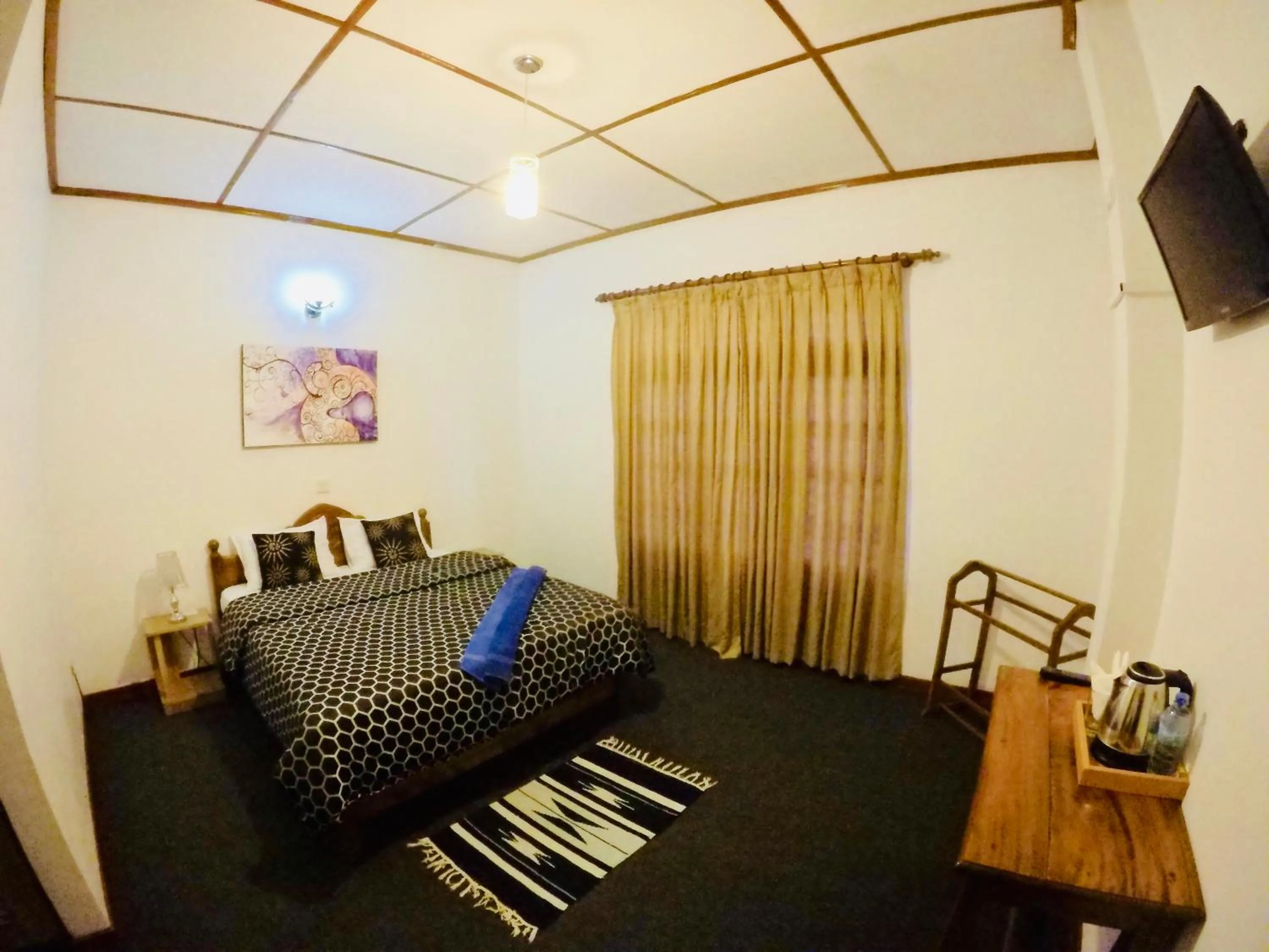 Bed in New Royal Mount Hotel