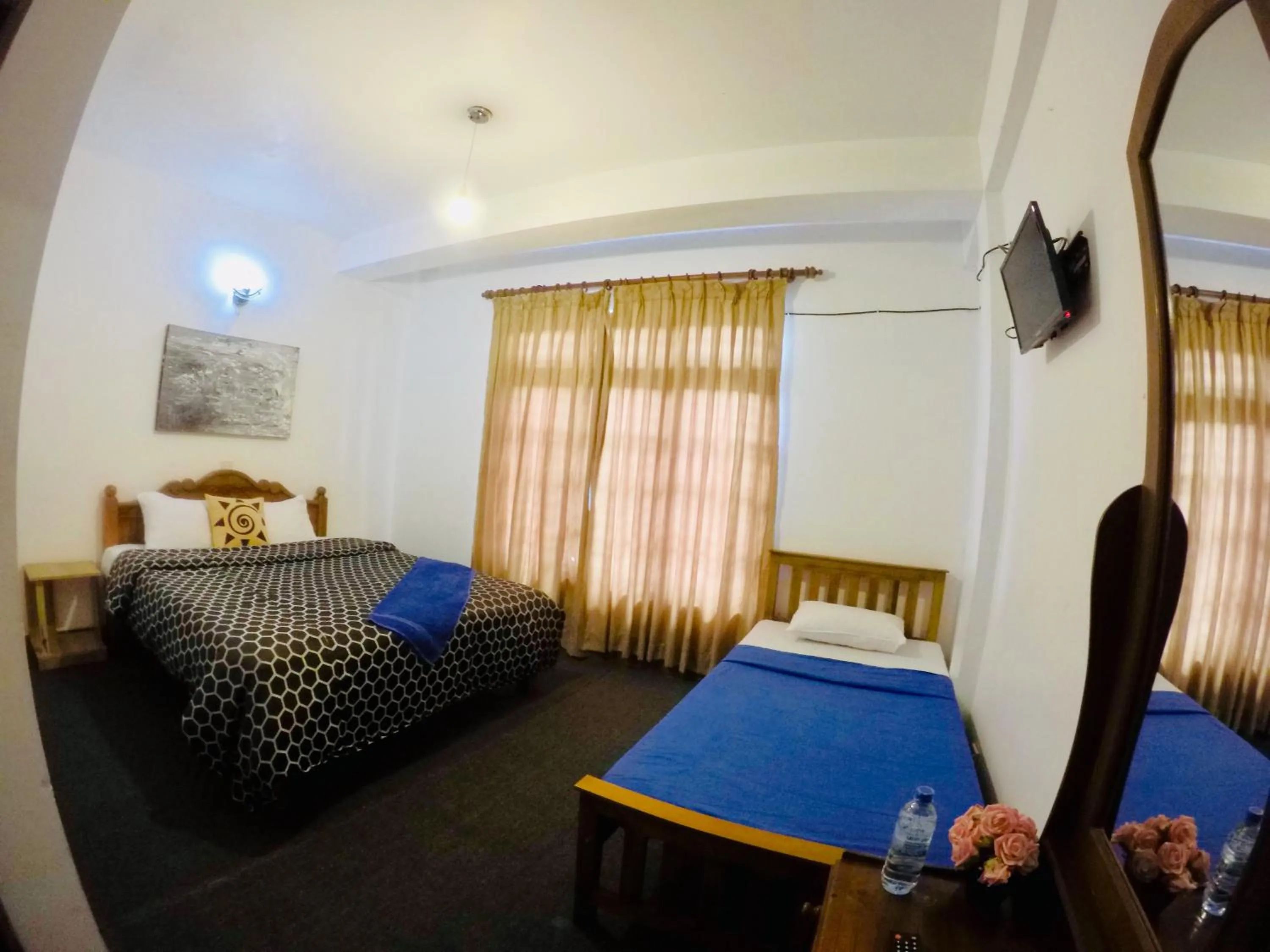 Bed in New Royal Mount Hotel