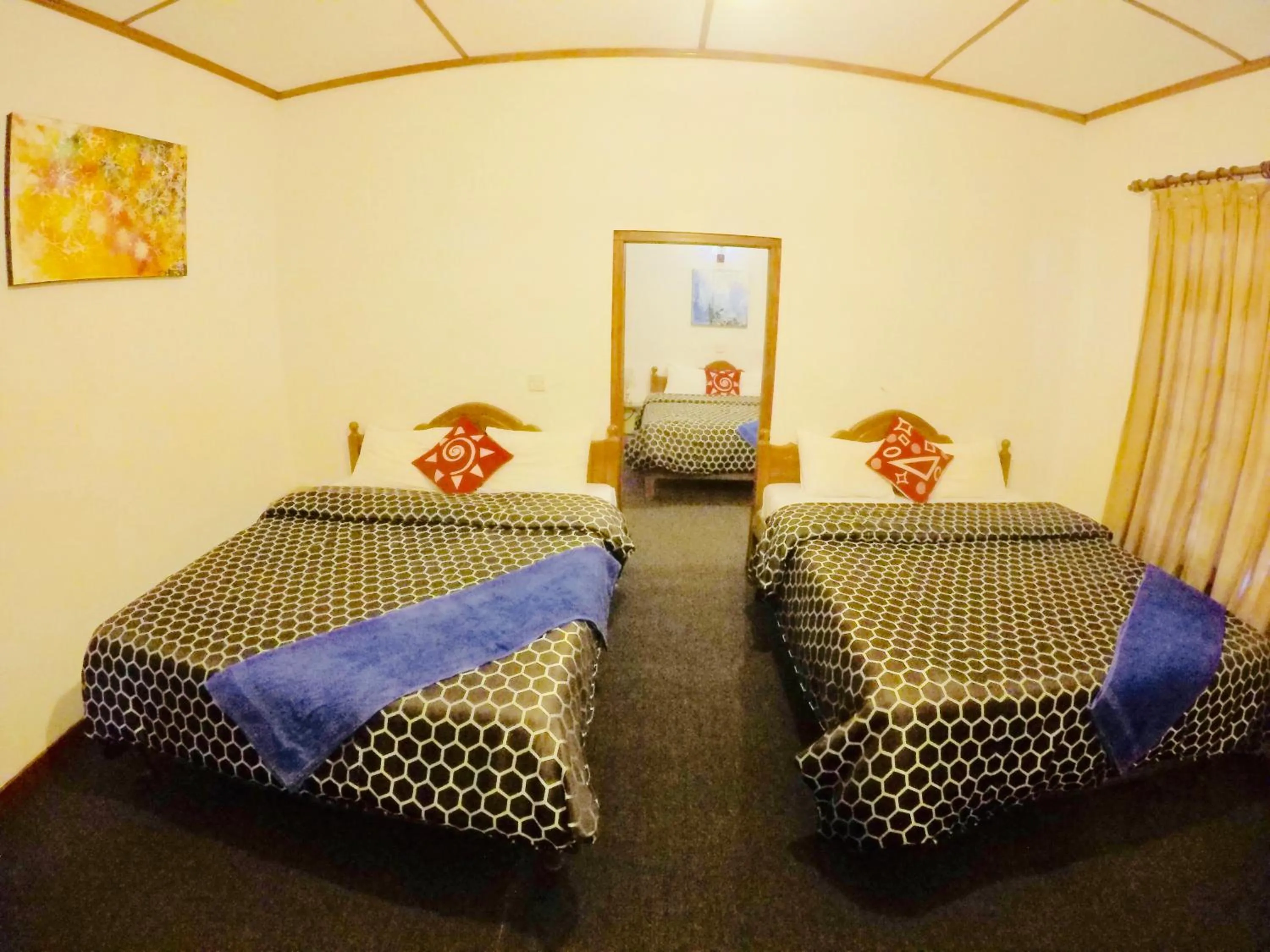 Bed in New Royal Mount Hotel