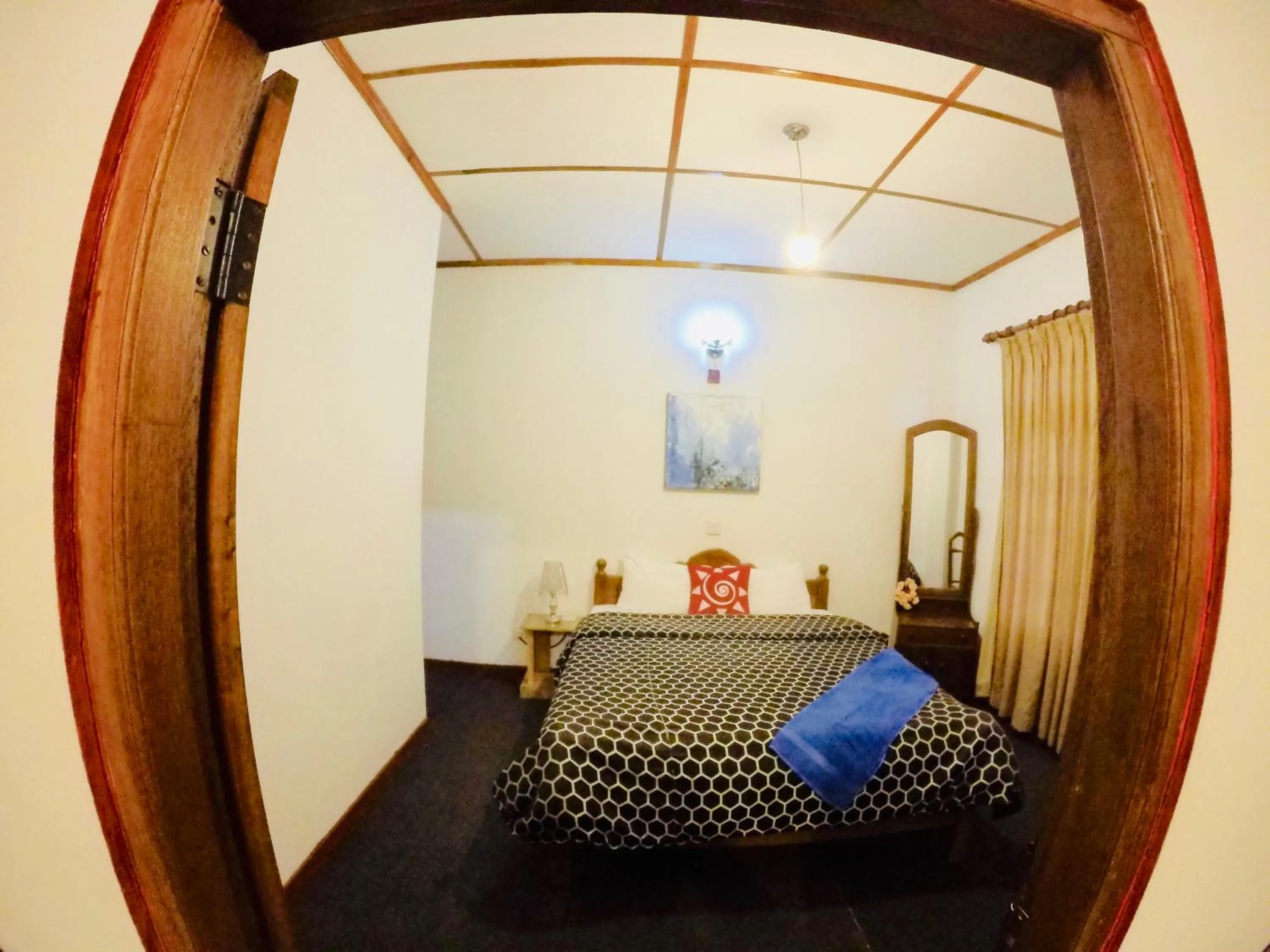 Bed in New Royal Mount Hotel