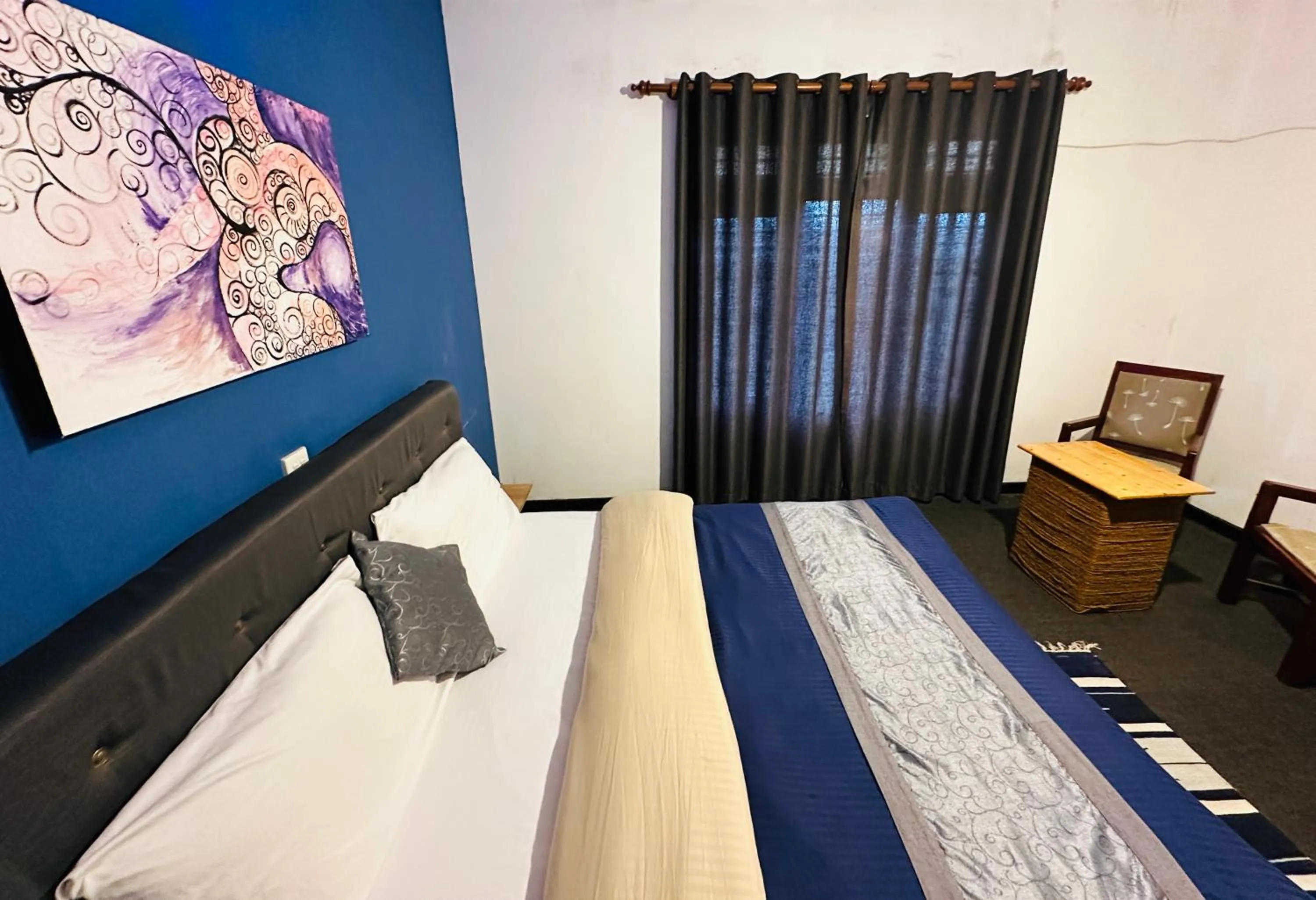 Bed in New Royal Mount Hotel