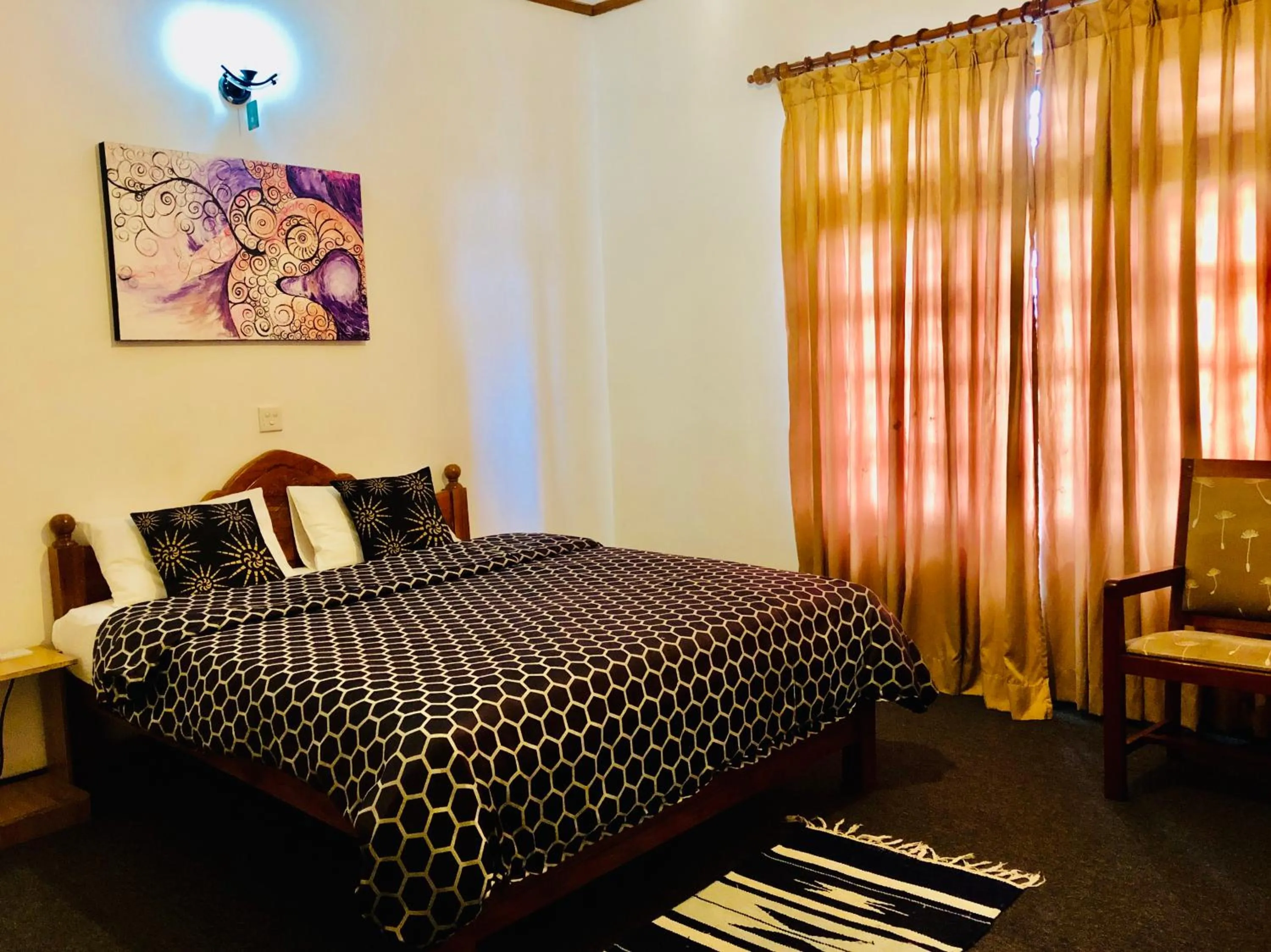 Bed in New Royal Mount Hotel