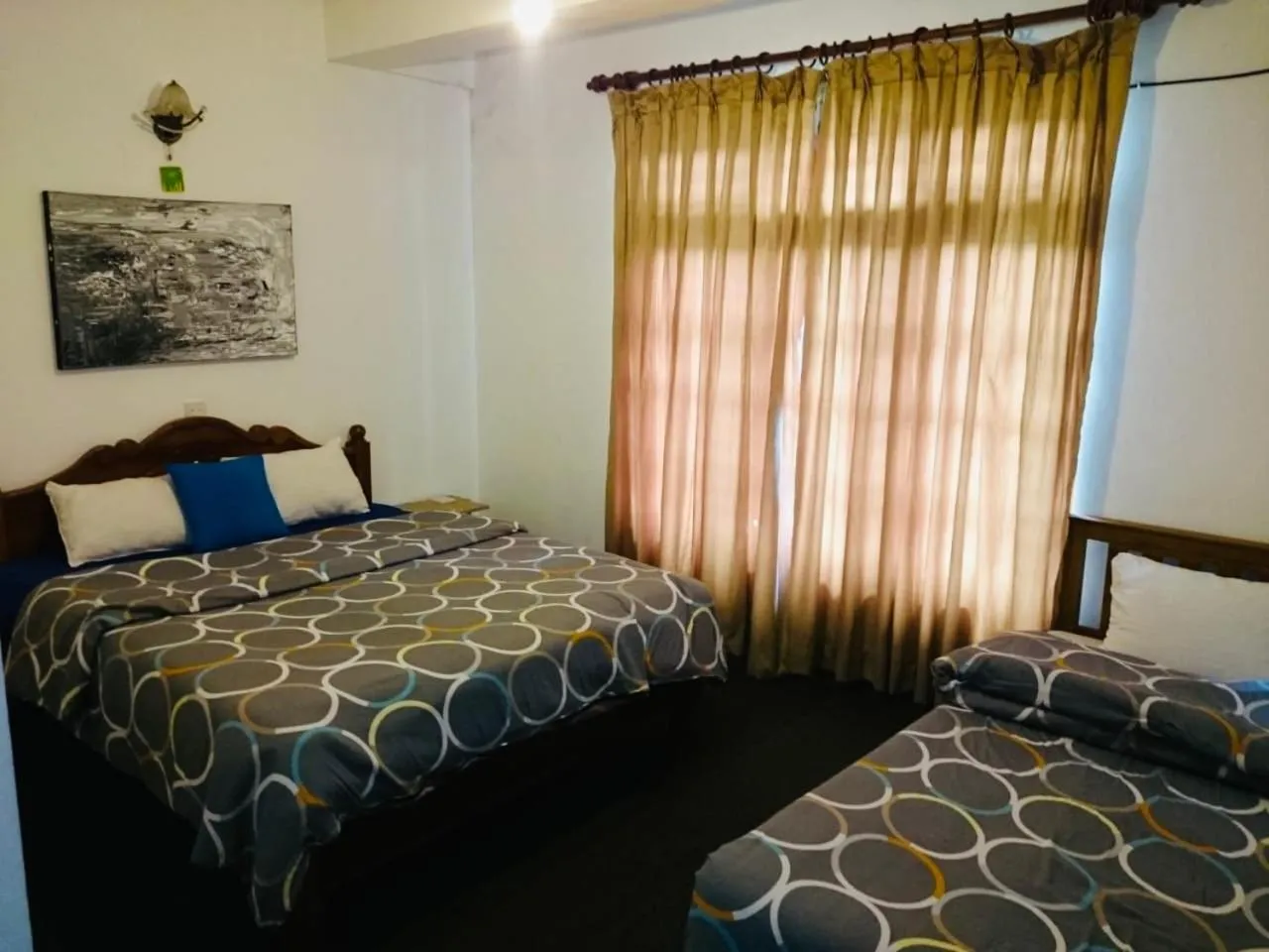 Bed in New Royal Mount Hotel