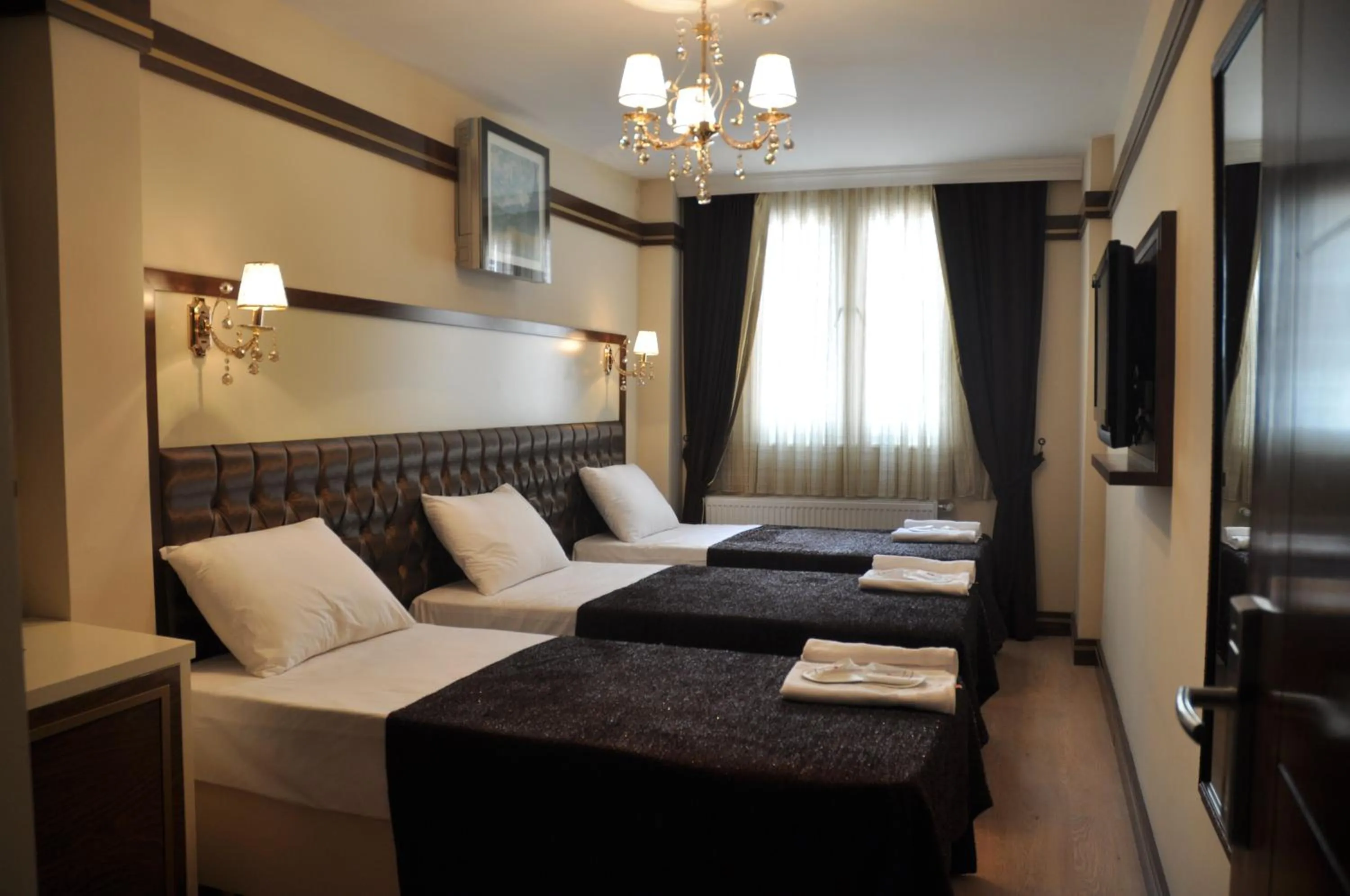 Photo of the whole room, Bed in Gloria Tibi Hotel