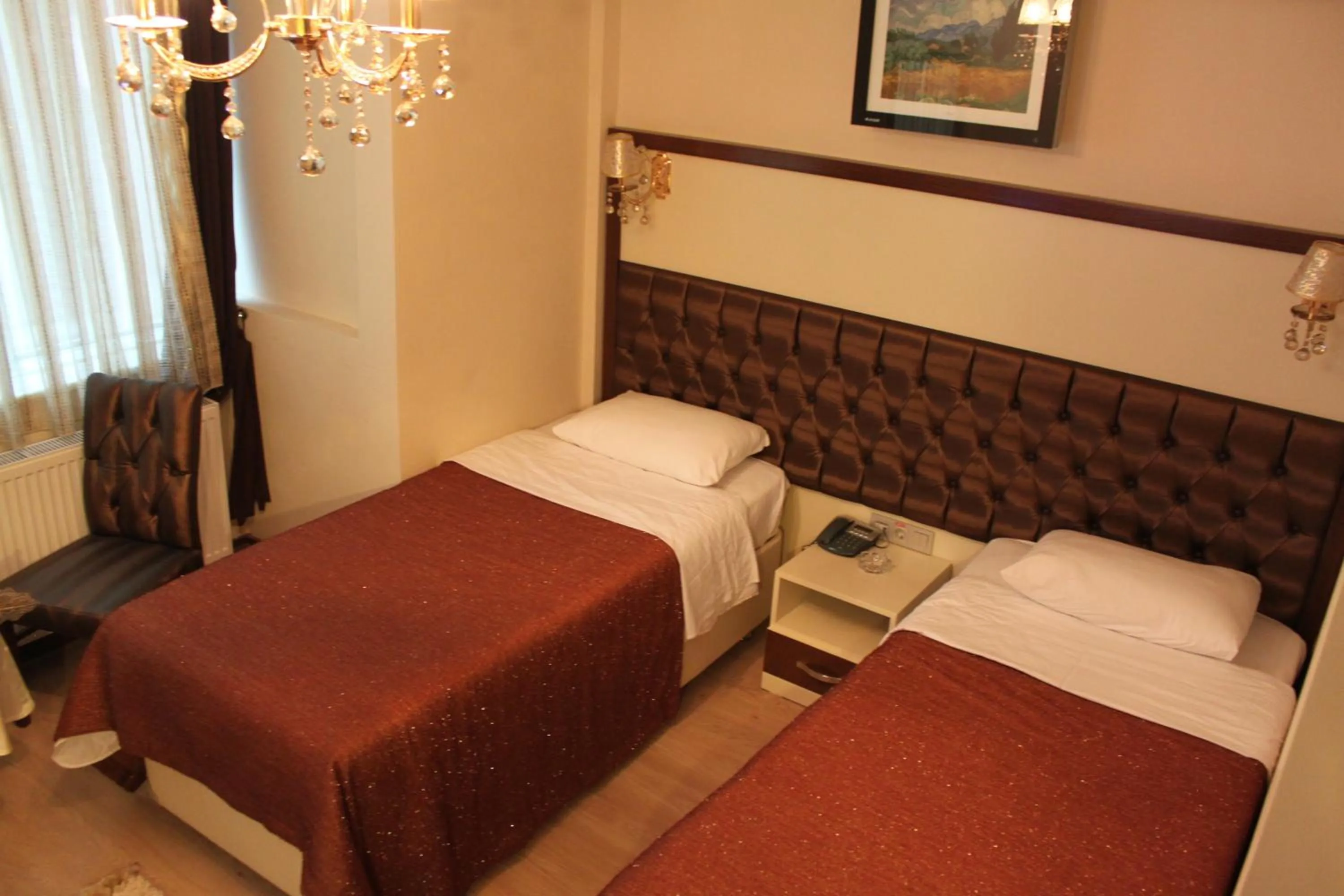 Photo of the whole room, Bed in Gloria Tibi Hotel