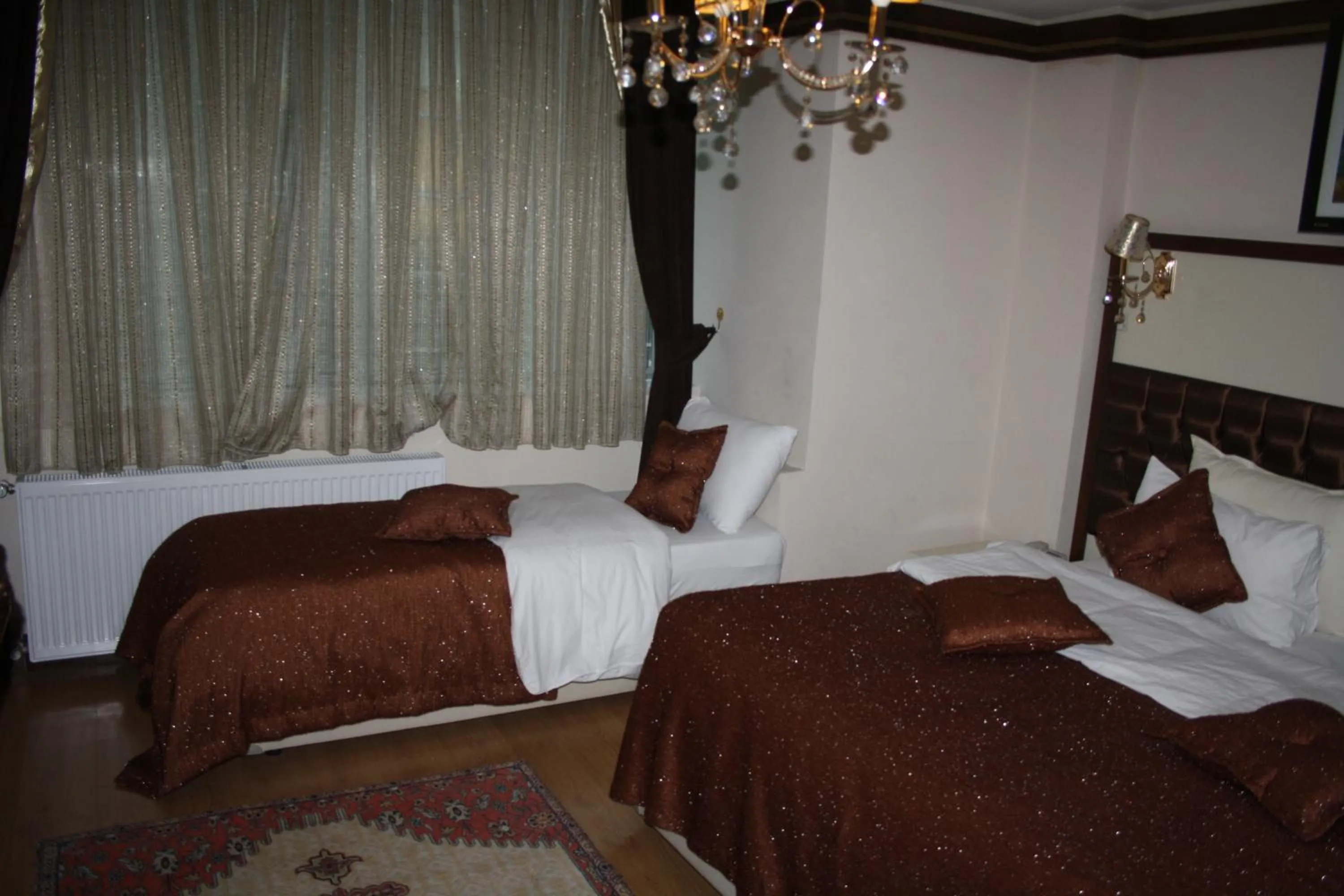 Bed in Gloria Tibi Hotel