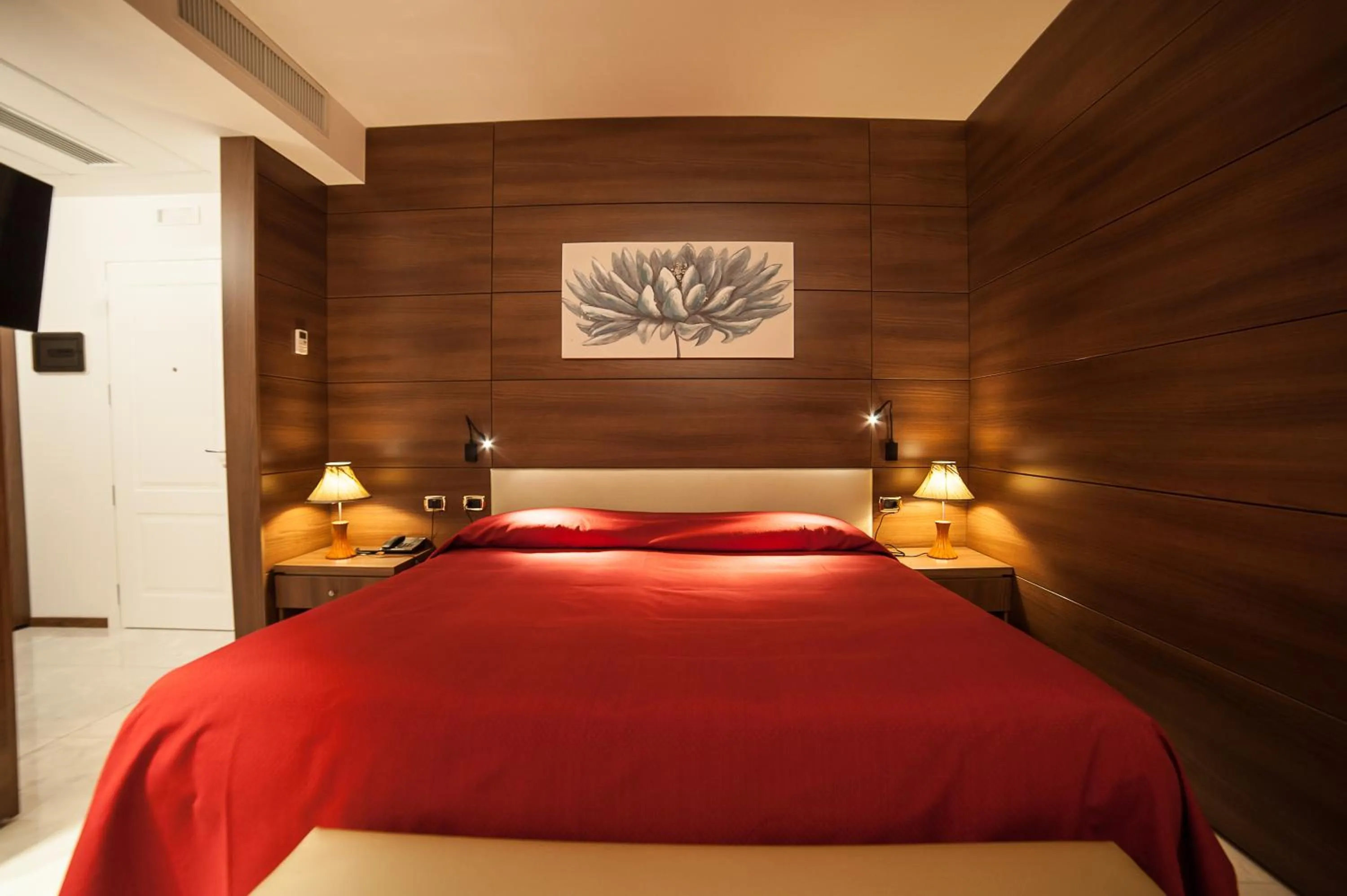 Bedroom, Bed in Family Center Hotel