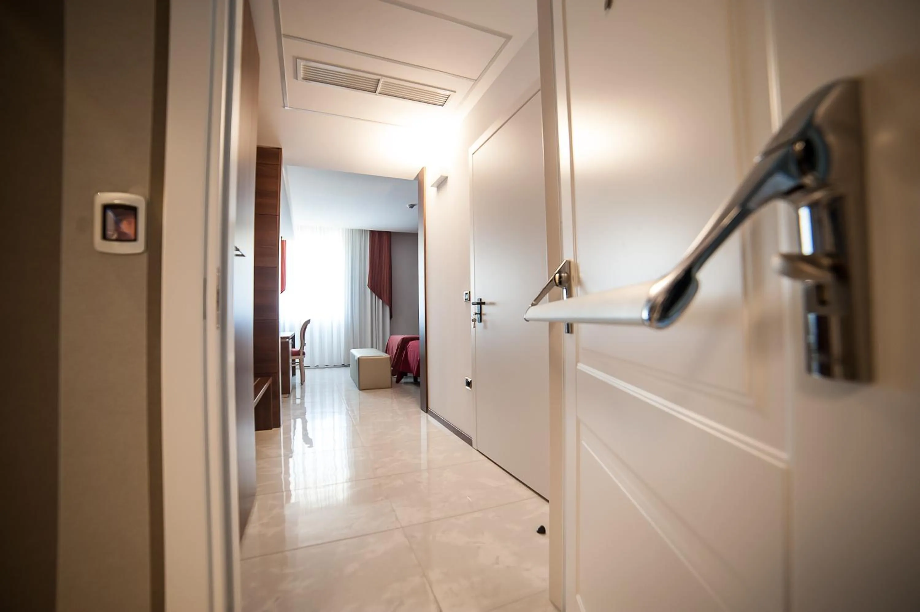 Bedroom in Family Center Hotel