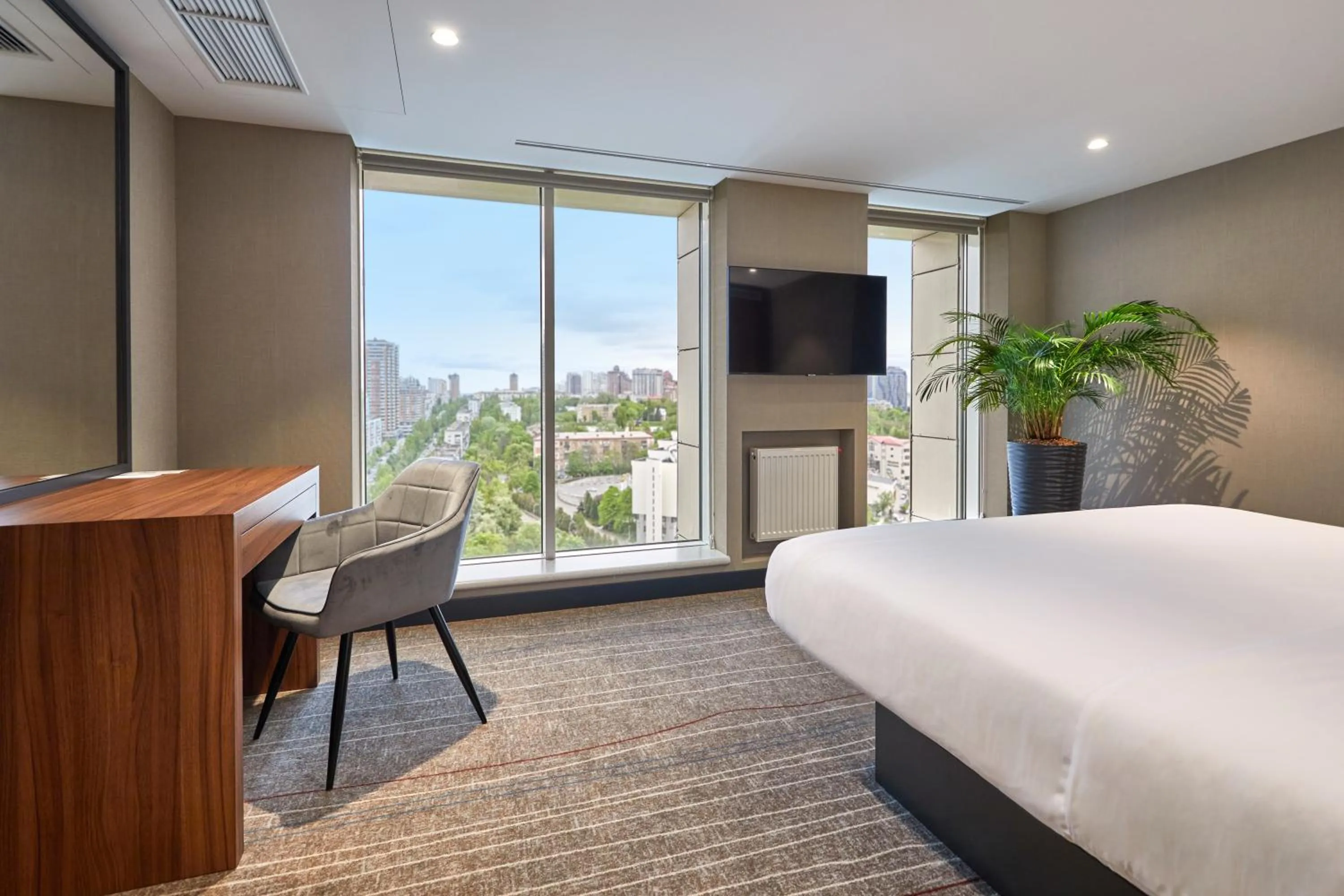 TV and multimedia, Bed in Sky Loft Hotel Kyiv by Rixwell International