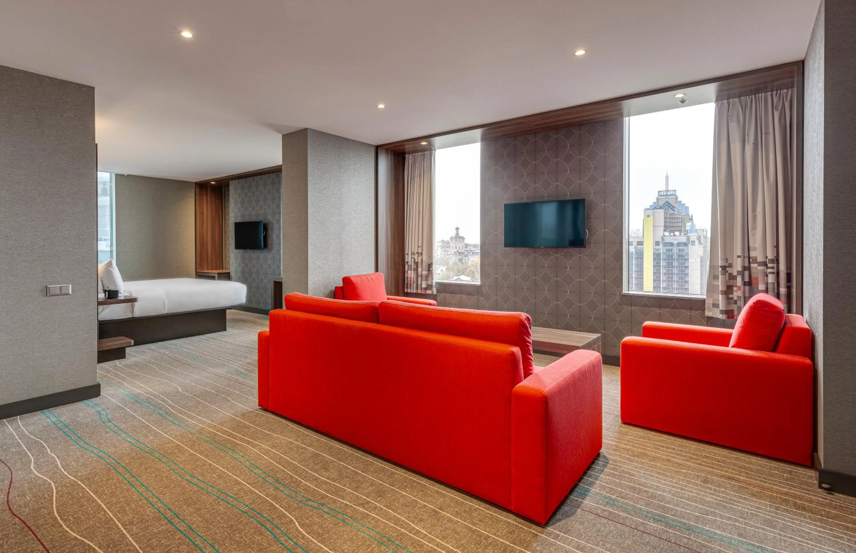 Living room, Bed in Sky Loft Hotel Kyiv by Rixwell International