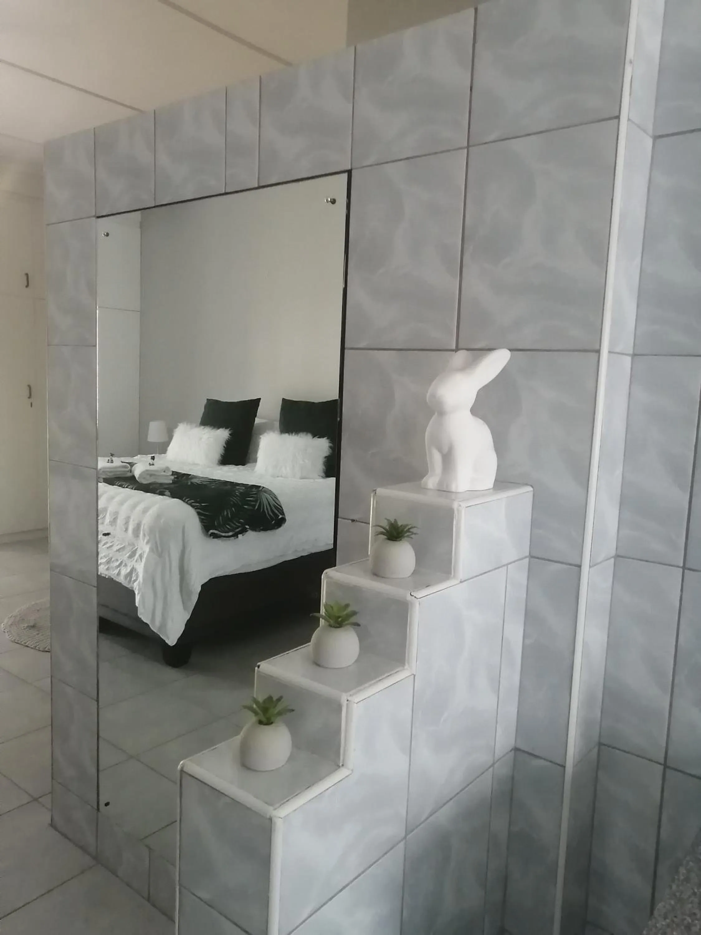 Bed in Oppi Draai Guesthouse