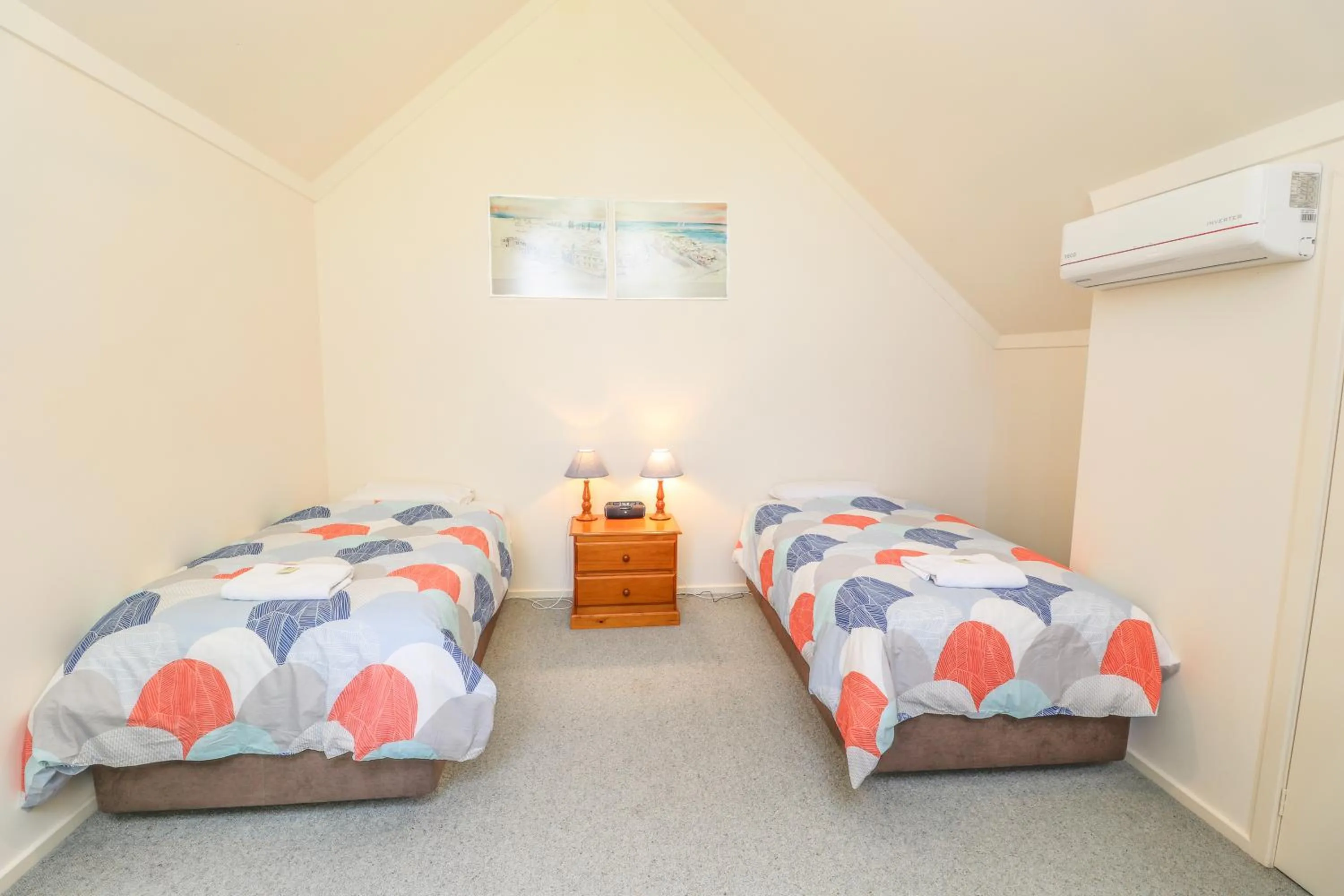 Bed in Bayshore Beachside Resort