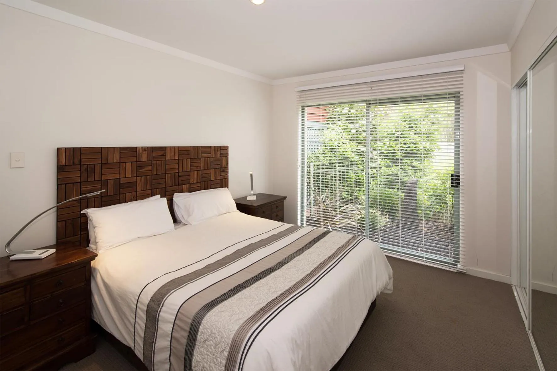 Bed in Bayshore Beachside Resort