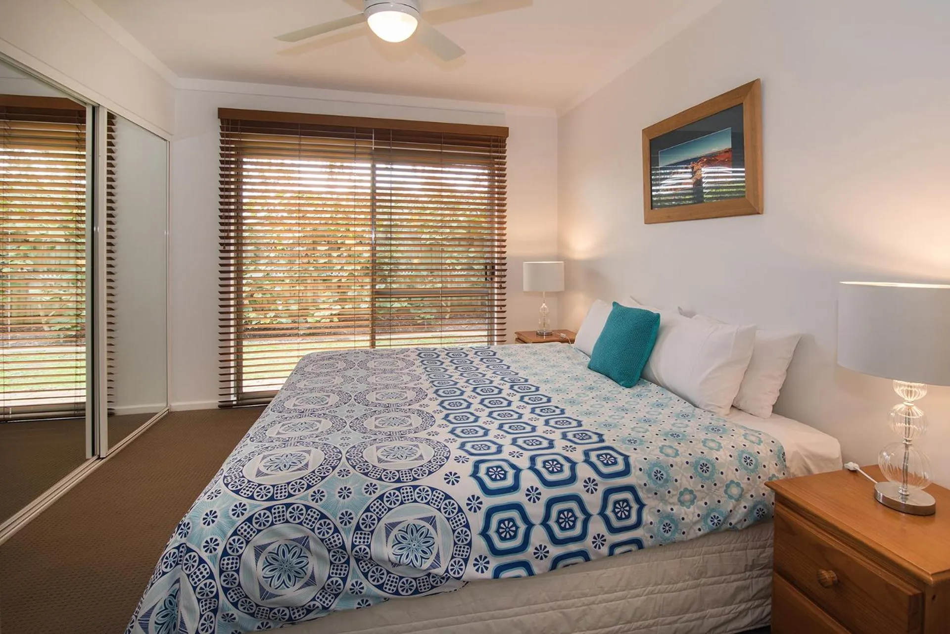 Bed in Bayshore Beachside Resort