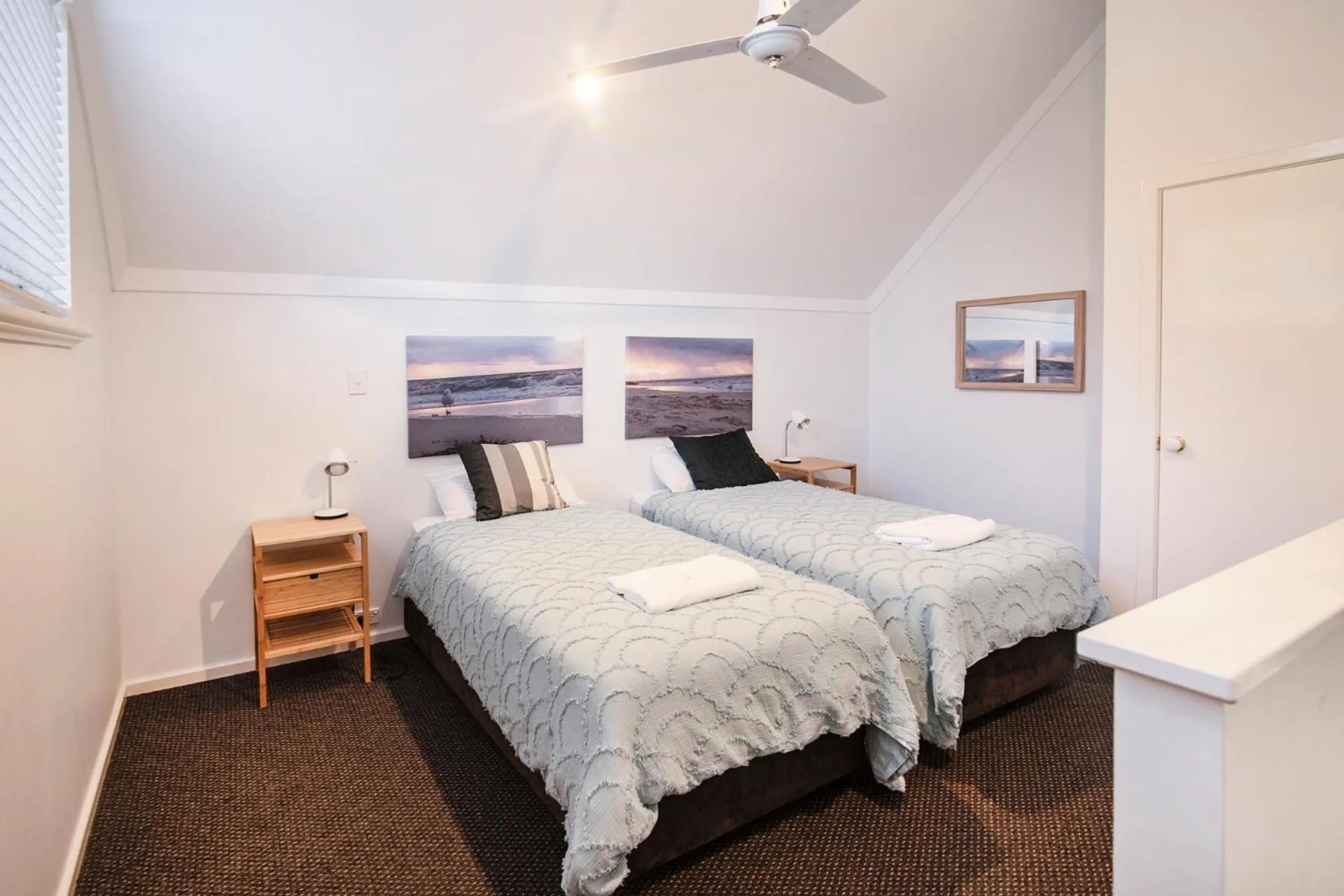 Bed in Bayshore Beachside Resort