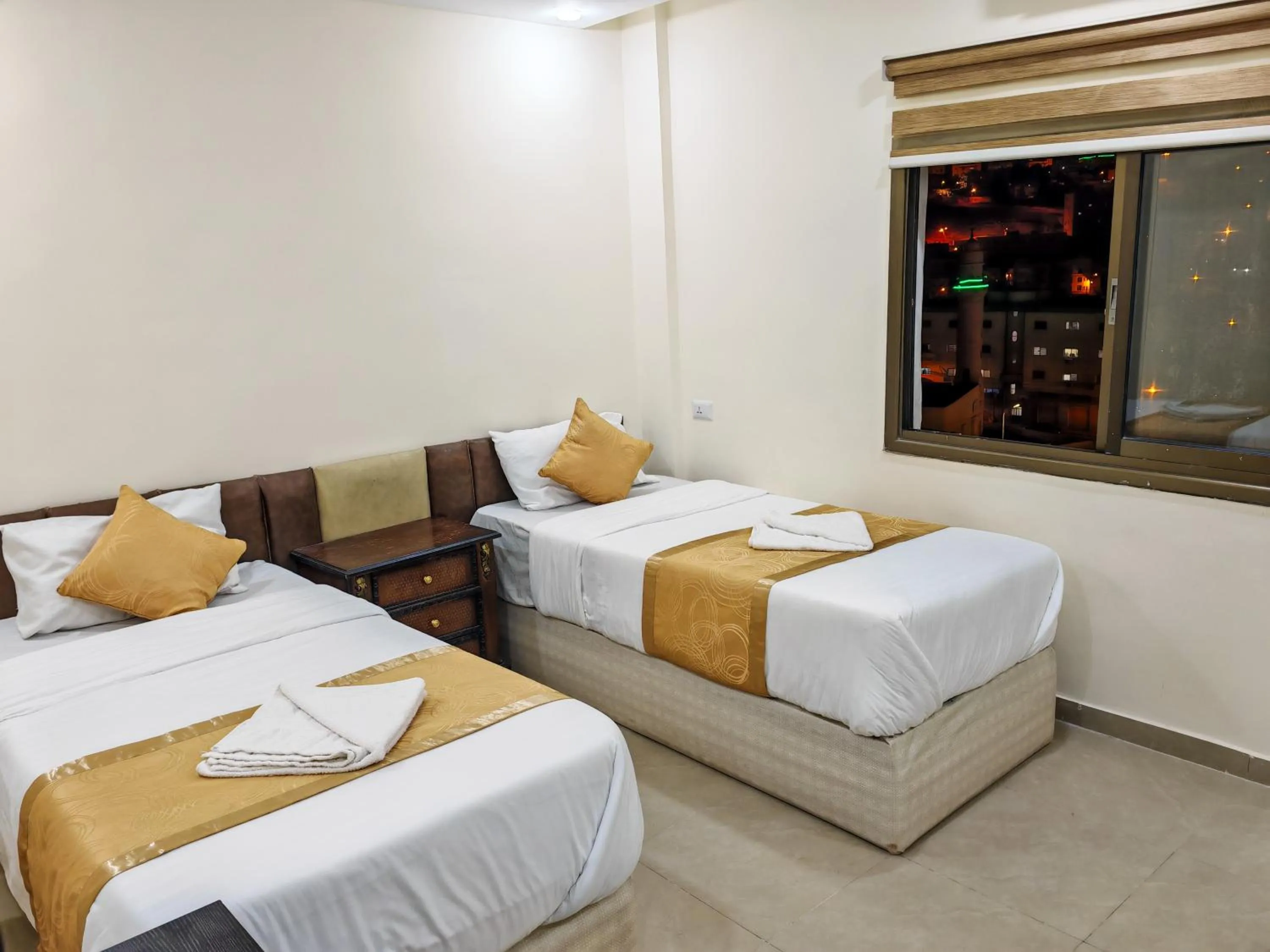 Bed in Petra Gate Hotel