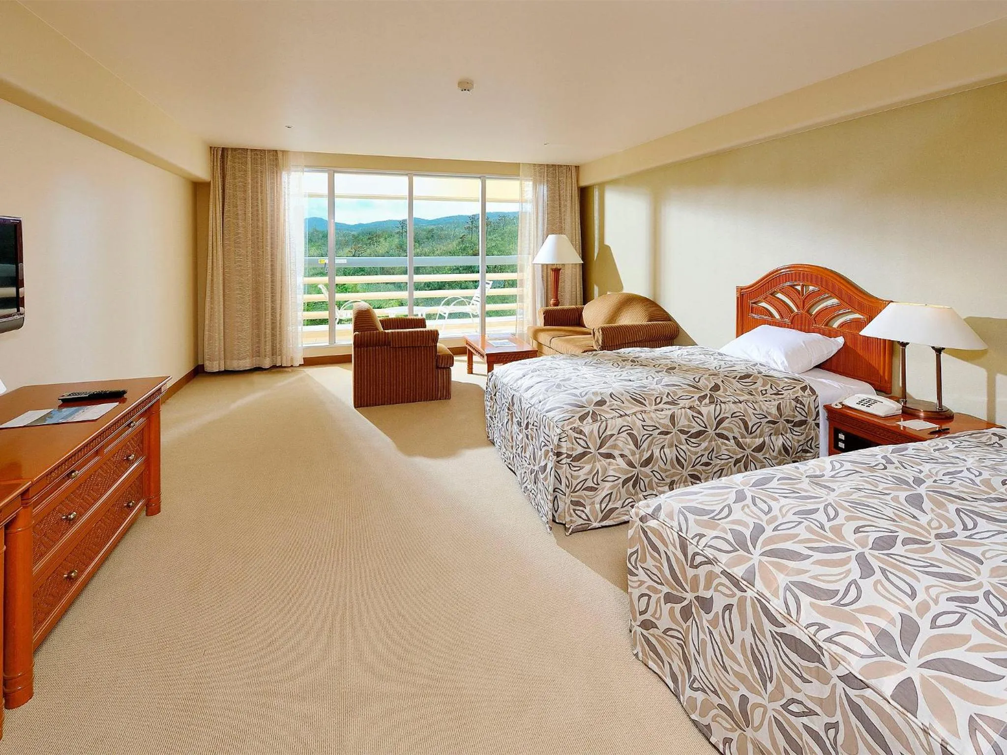 Bed in Rizzan Sea Park Hotel Tancha Bay