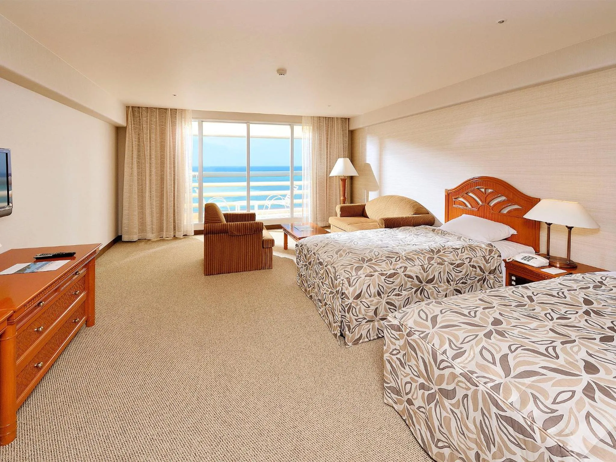 Photo of the whole room, Bed in Rizzan Sea Park Hotel Tancha Bay