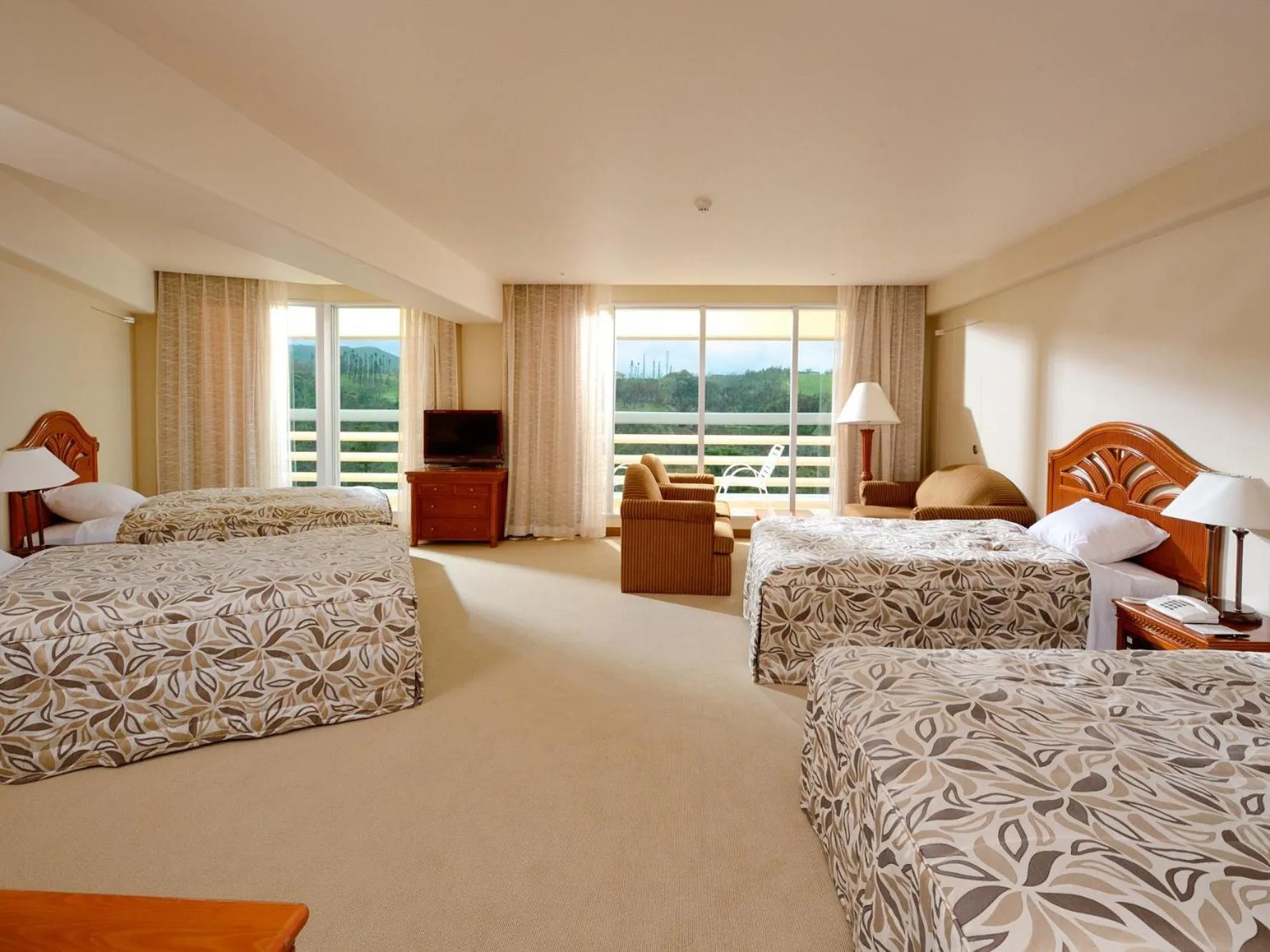 Bed in Rizzan Sea Park Hotel Tancha Bay