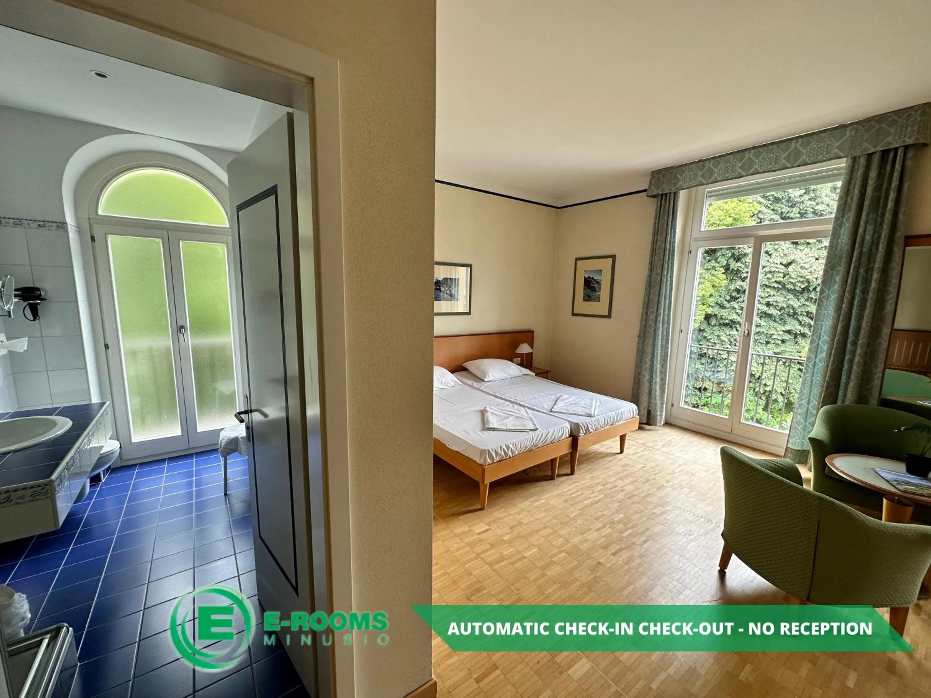 Photo of the whole room, Bed in E-Rooms Minusio