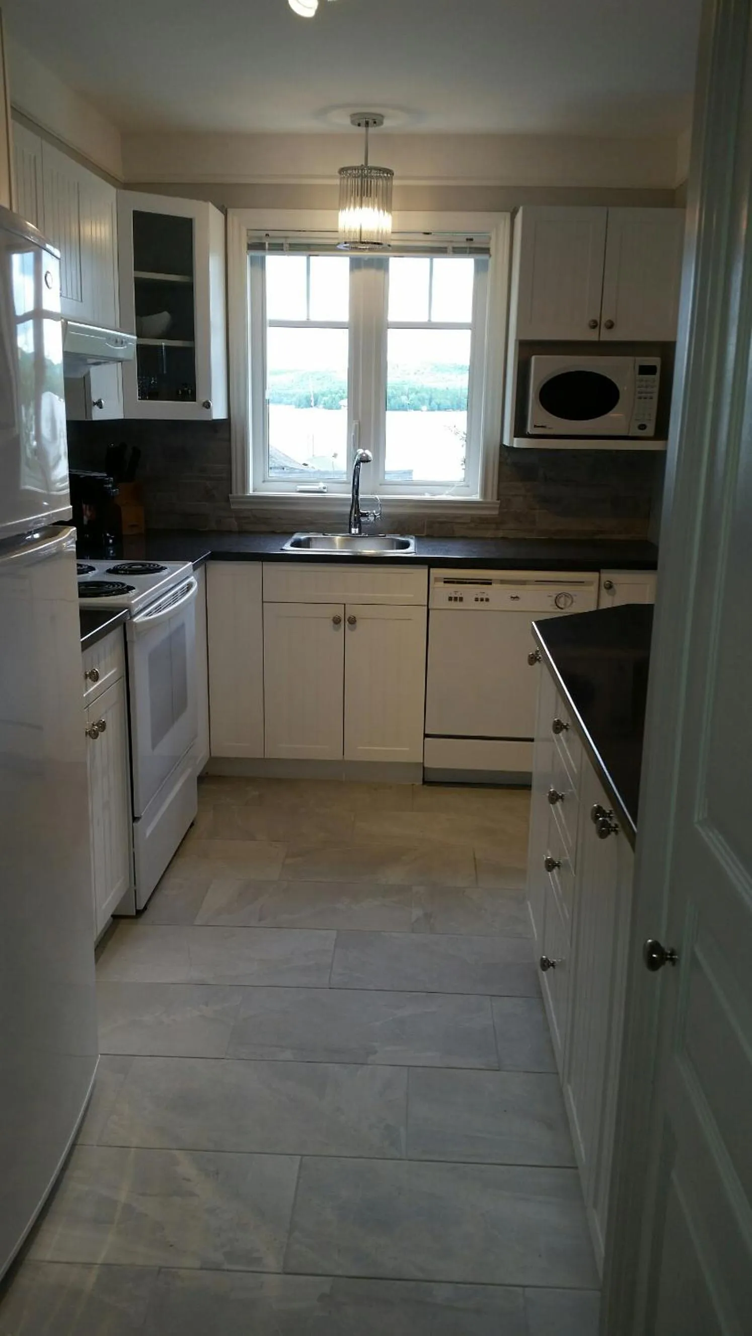 Kitchen or kitchenette in Condo Lac Archambault 295