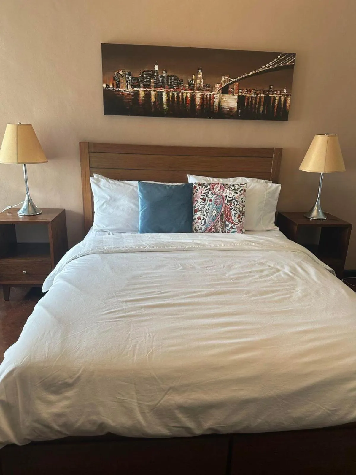 Bed in Suites de Marina Manila with Netflix