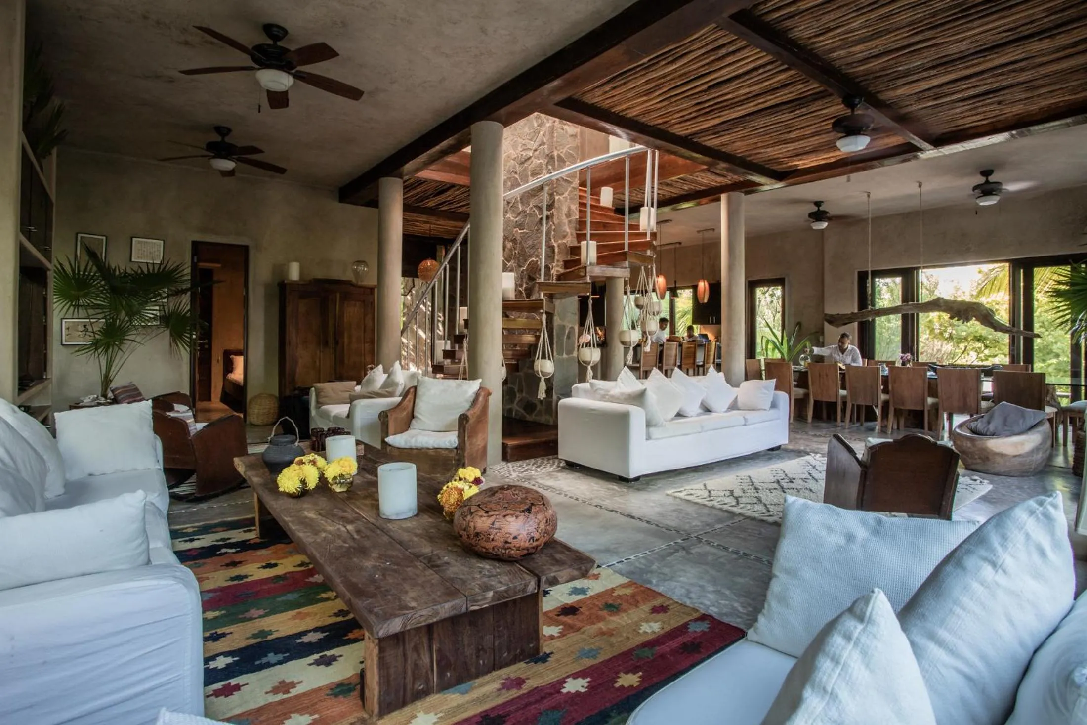 Communal lounge/ TV room in Casa Maya Kaan