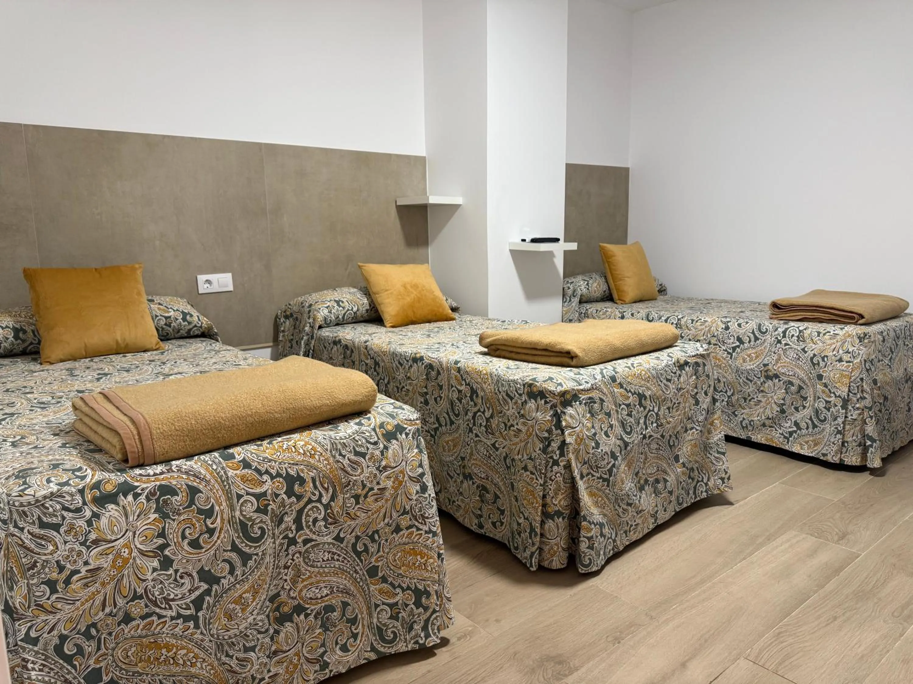 Bed in Hotel Quitagolpe