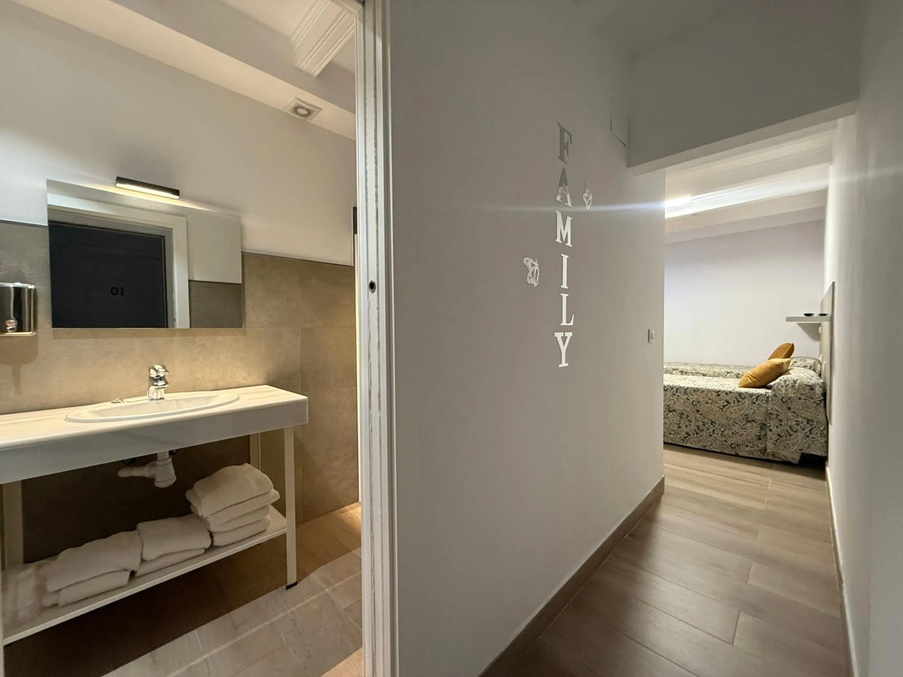 Bed in Hotel Quitagolpe