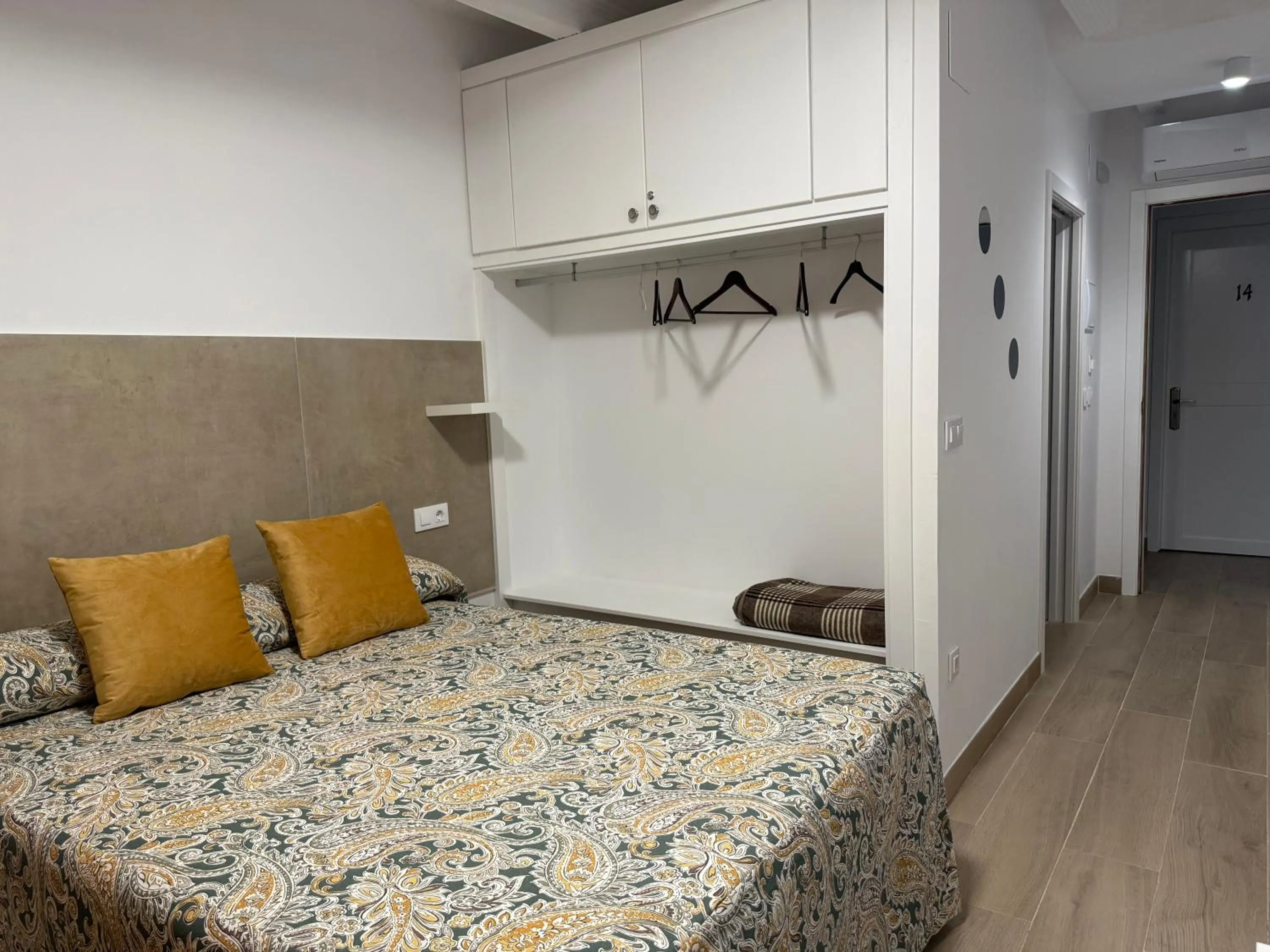 Bed in Hotel Quitagolpe