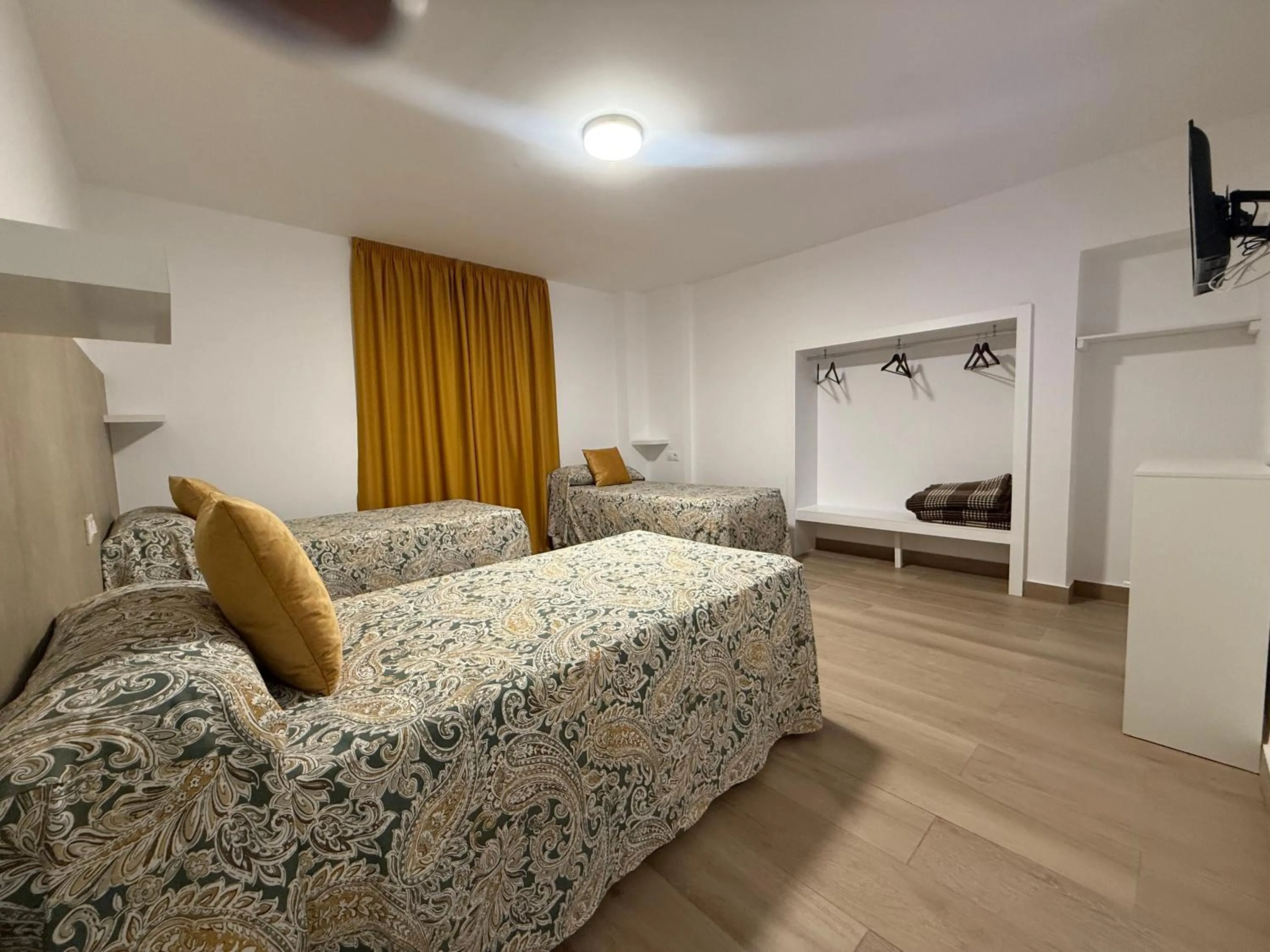 Bed in Hotel Quitagolpe