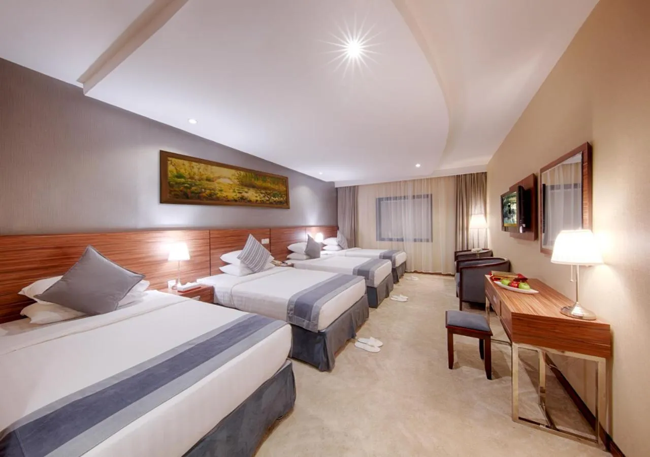 Bed in Al Safwah Orchid Hotel