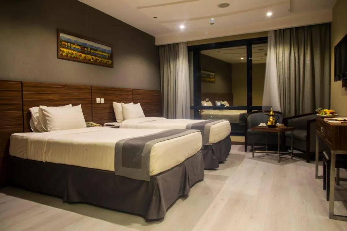 Bed in Al Safwah Orchid Hotel